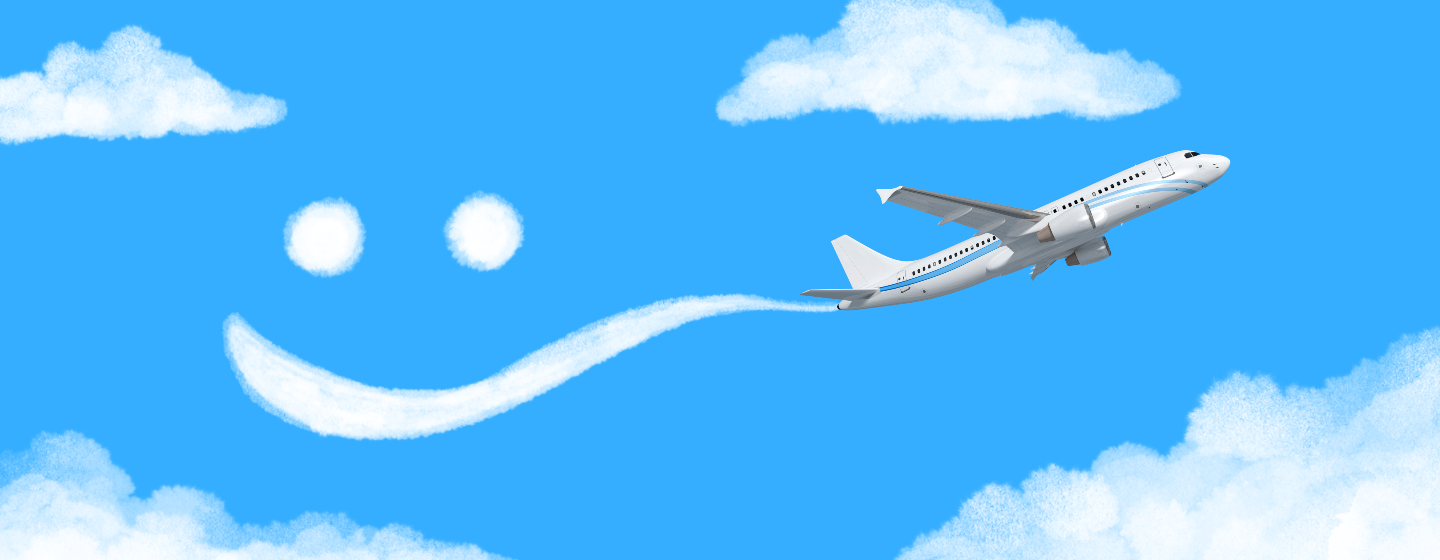 photo_illustration_of_airplane_making_a_smiley_face_in_the_sky_by_GettyImages-996084732_1440x560.png