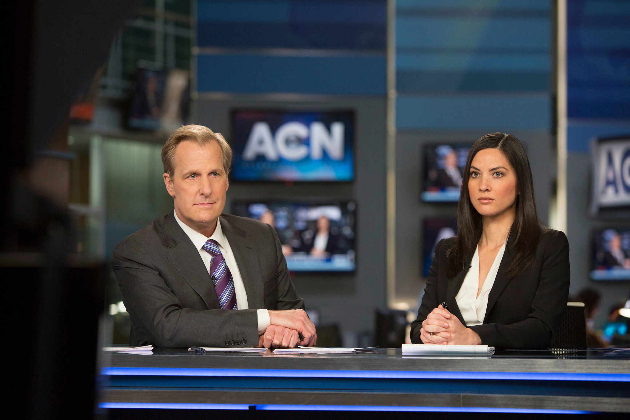 jeff daniels and olivia munn in a scene from an episode of the newsroom