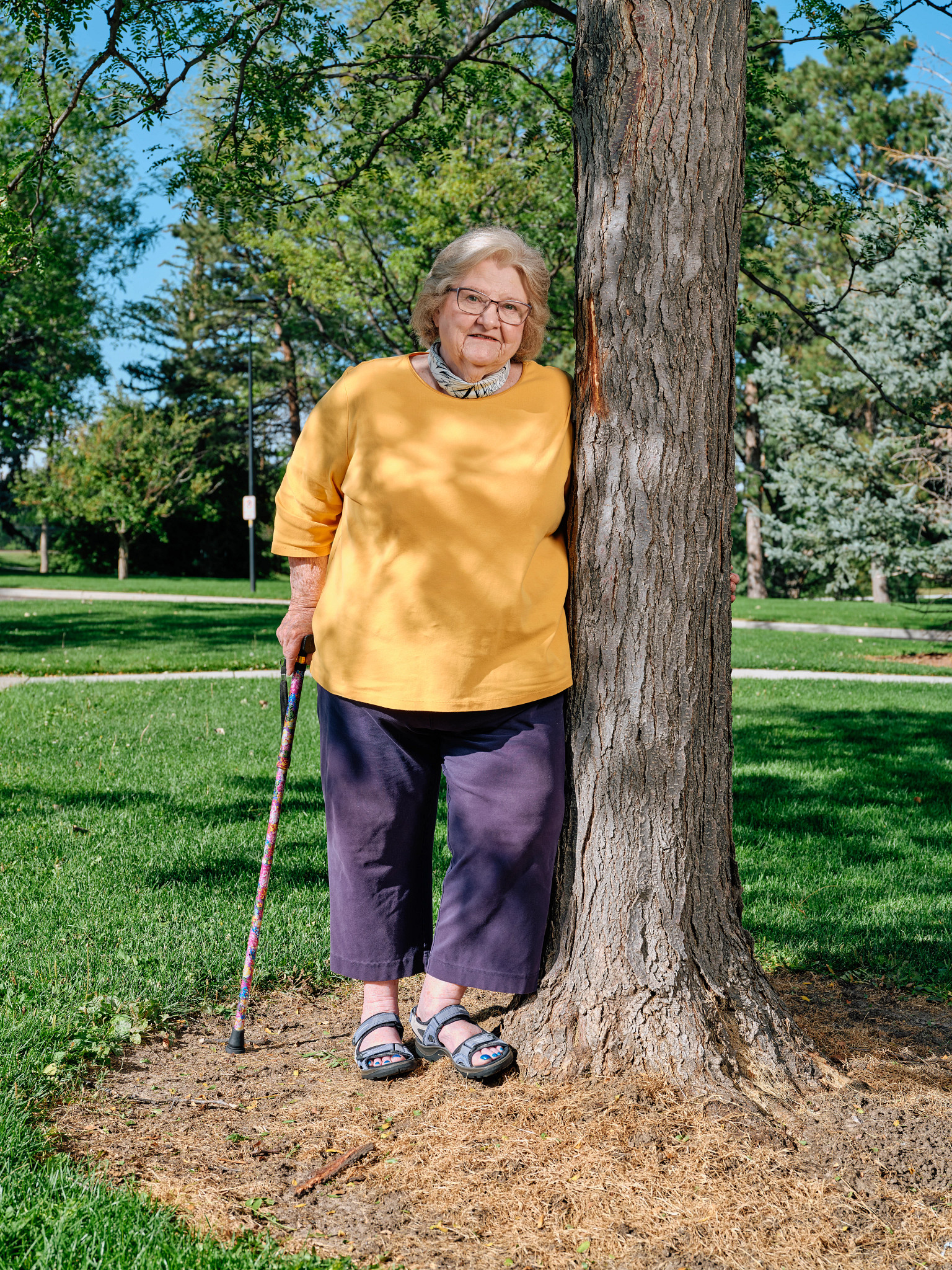 Vicki Ivey leaning against a tree