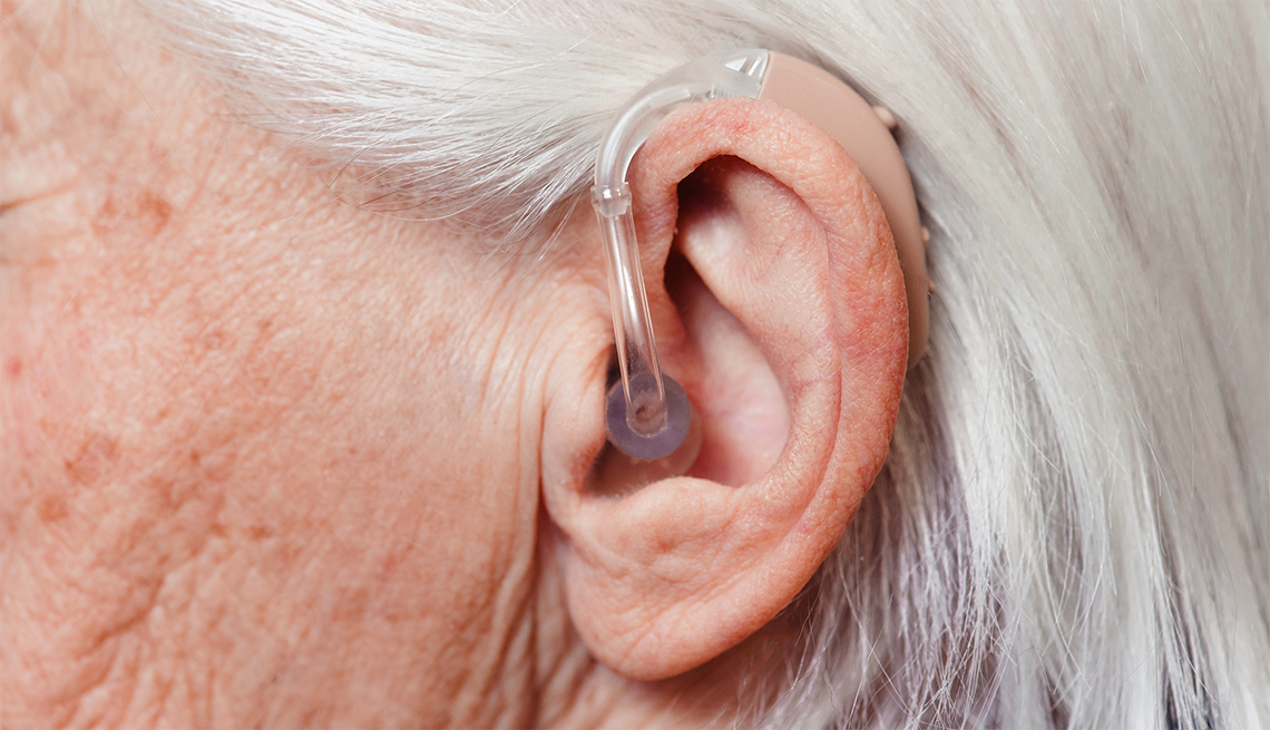 close up of hearing aid in a woman's ear