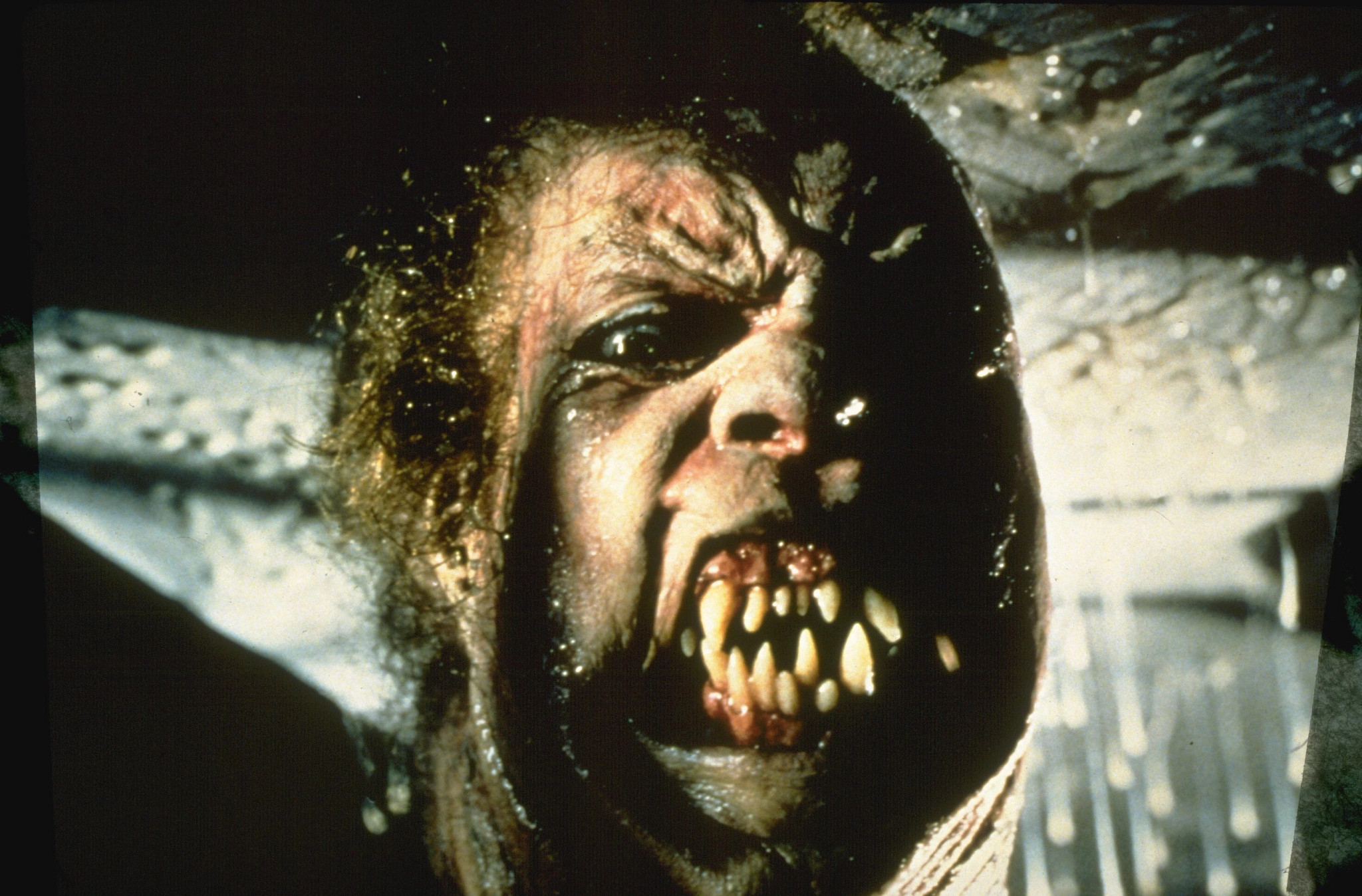a mutated character in a scene from The Thing