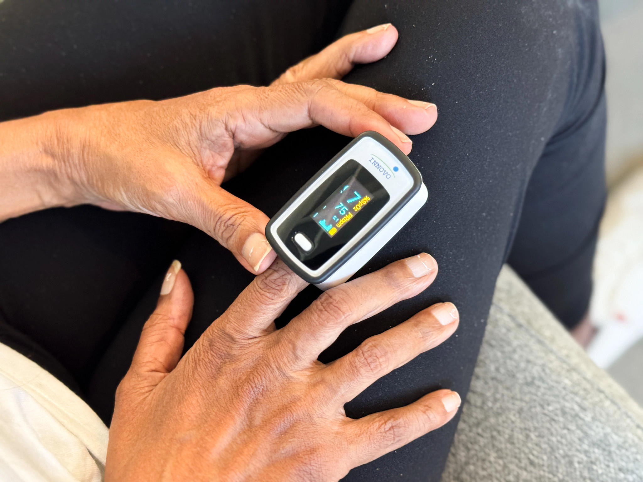 a person testing their pulse