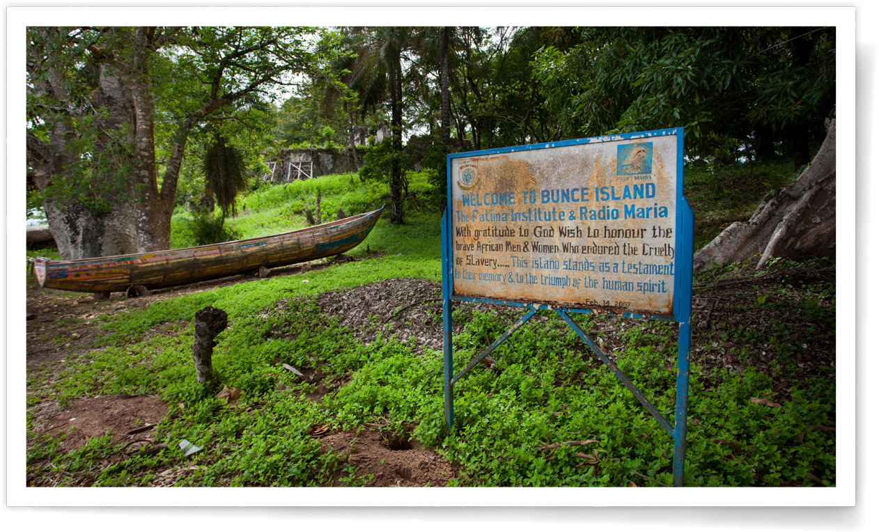 The tour group dressed in all white for the memorial a memorial on Bunce Island in Sierra Leone