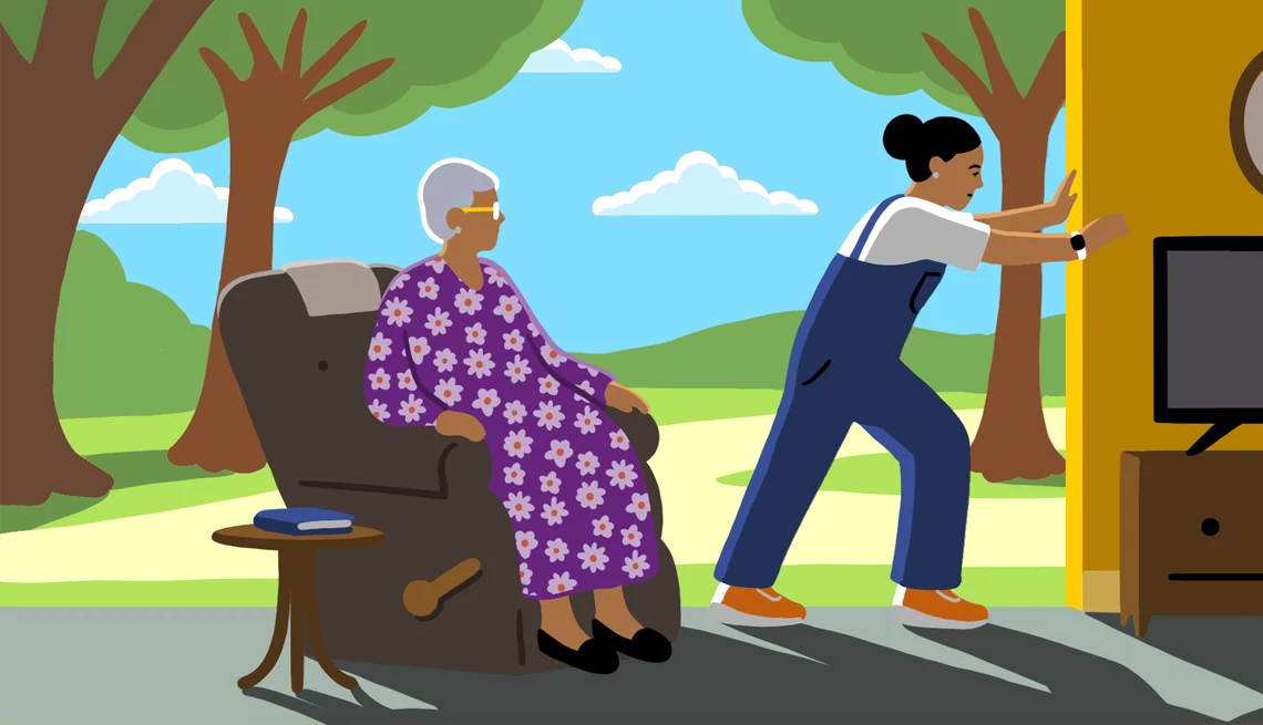 a person trying to help another person move off of a chair