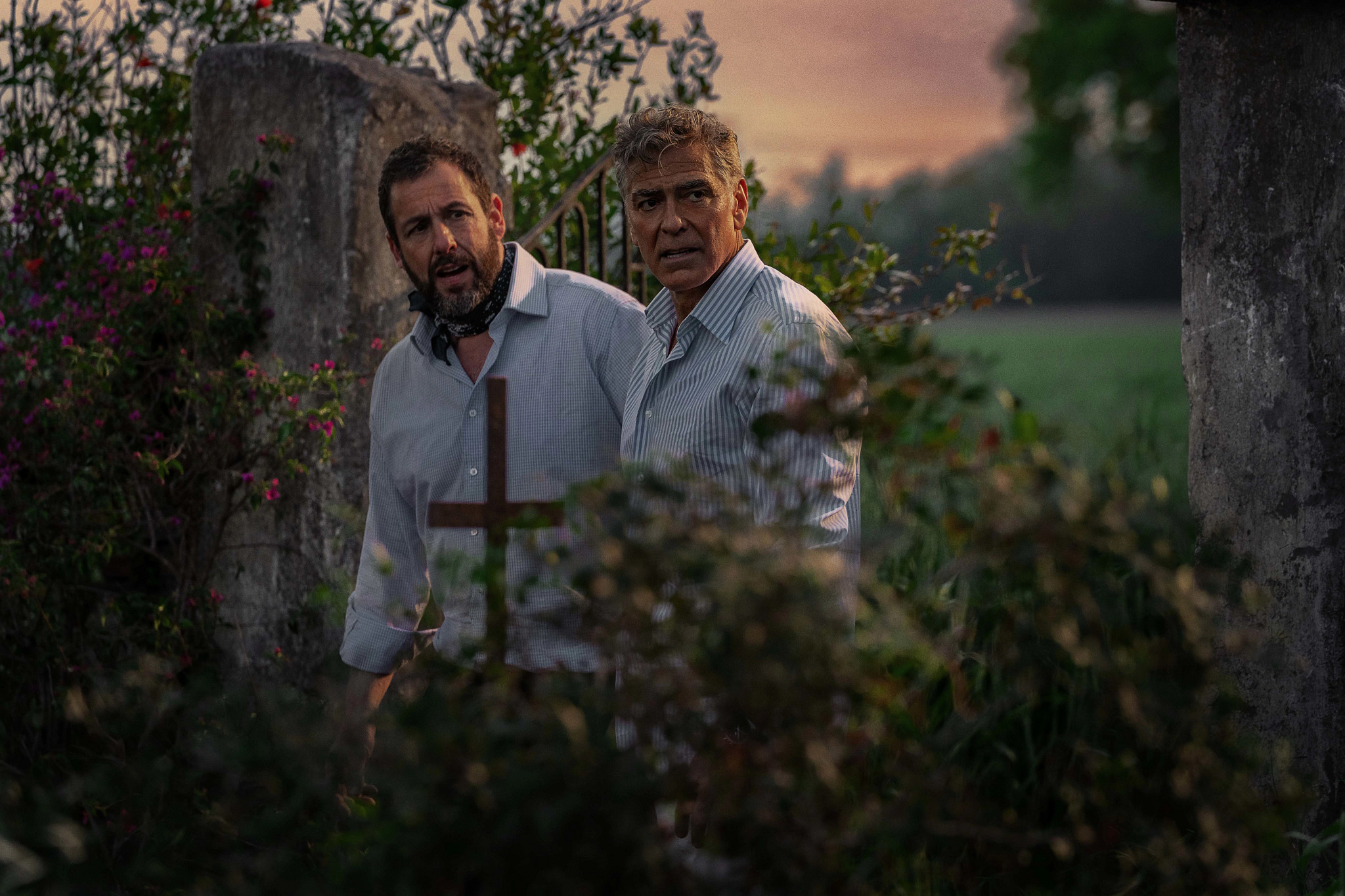 adam sandler and george clooney in a scene from jay kelly