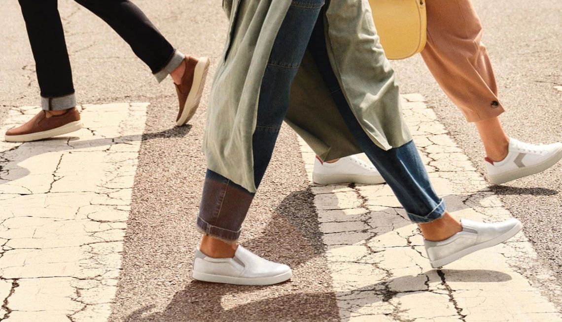 Dr. Scholl's Shoes People walking on crosswalk wearing comfy shoes