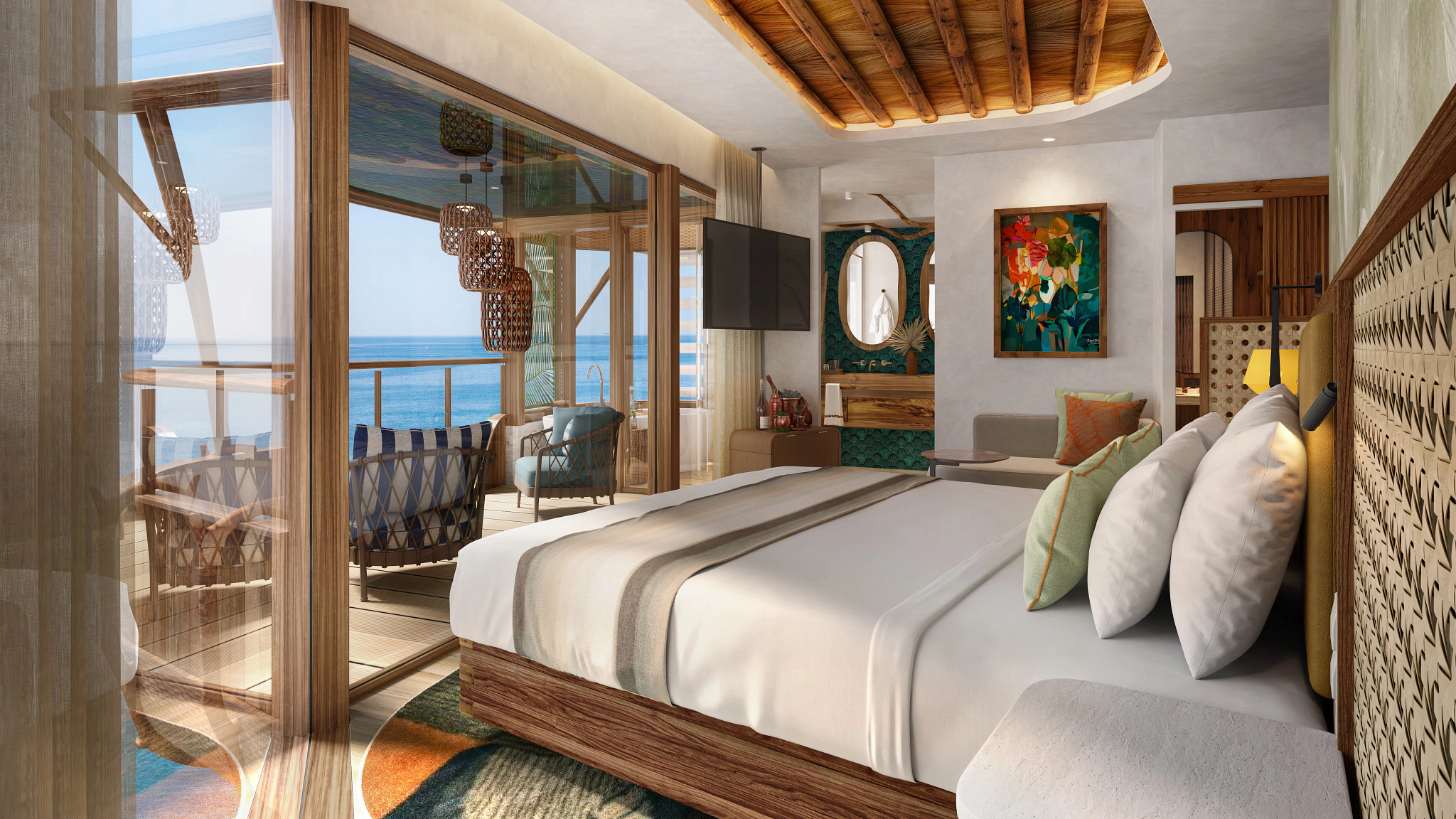 Luxury ocean-view primary bedroom aboard a cruise ship featuring a large bed with decorative pillows, warm wood finishes, colorful artwork, floor-to-ceiling glass doors, and a private balcony overlooking the sea