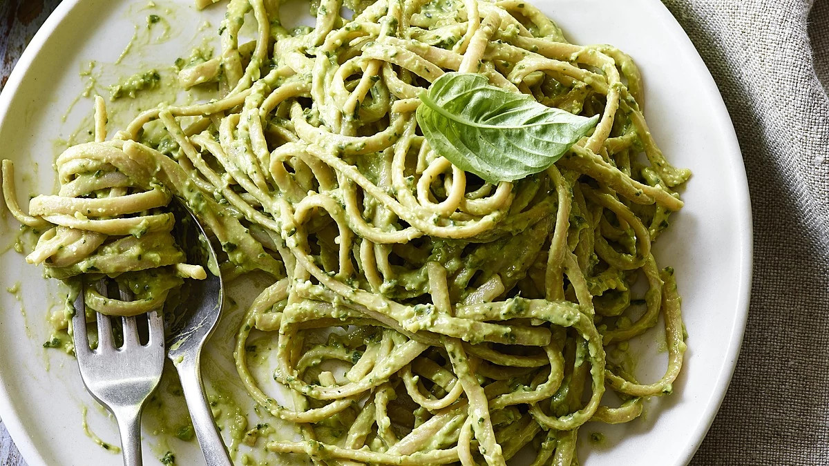 A close-up view of avocado pesto on a plate