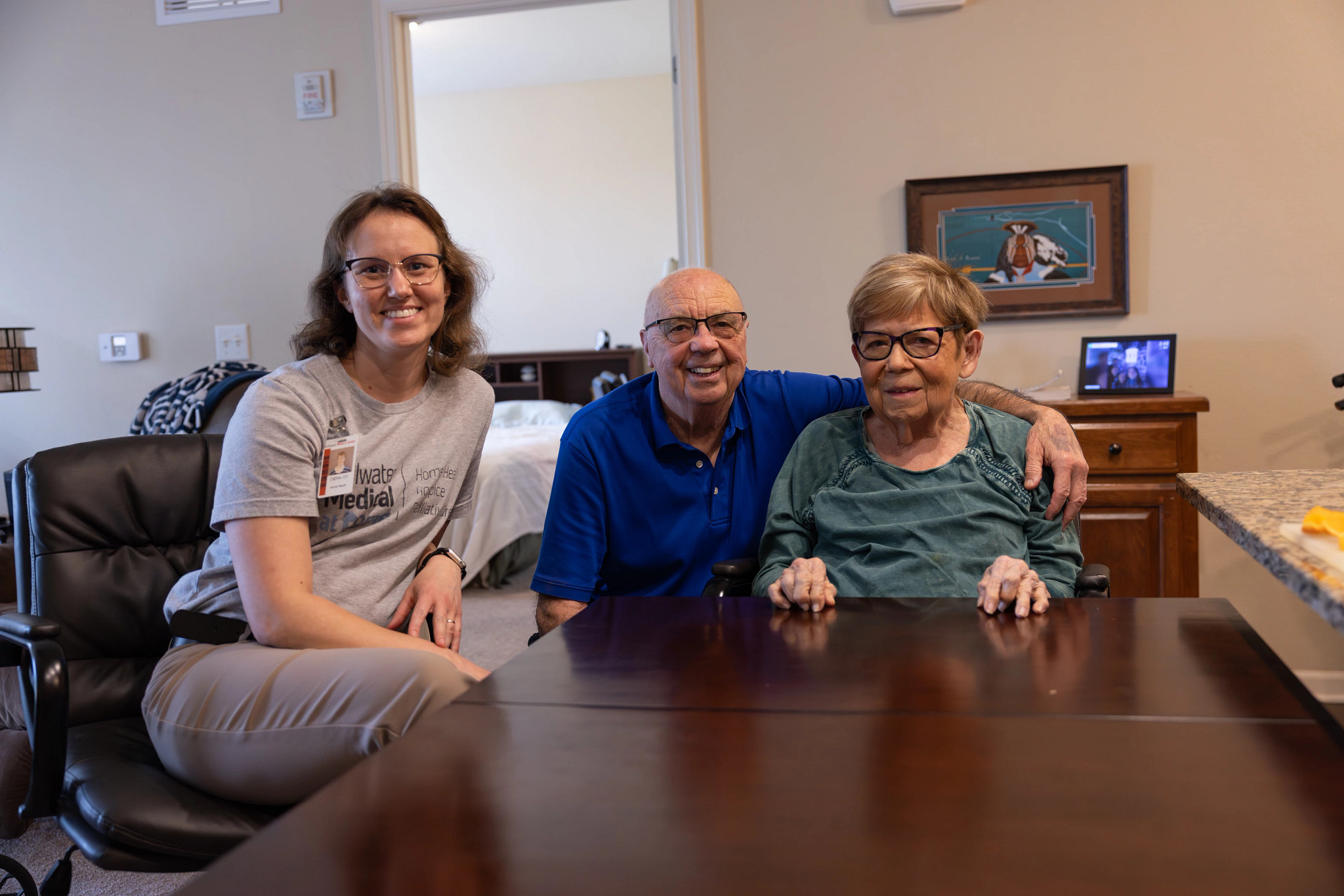 people taking a picture in a living room