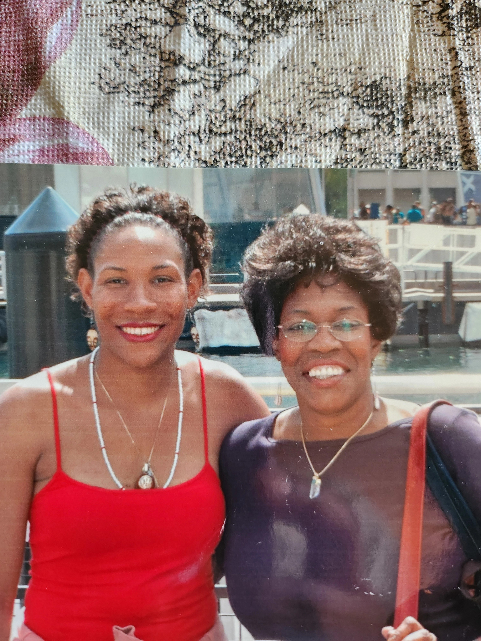 two women smile at the camera