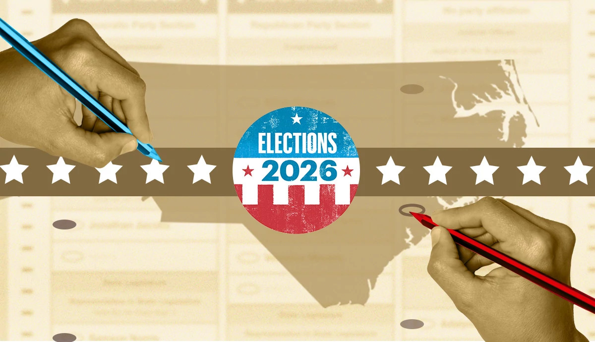 two hands holding a red pencil and a blue pencil with the outline of the state of north carolina