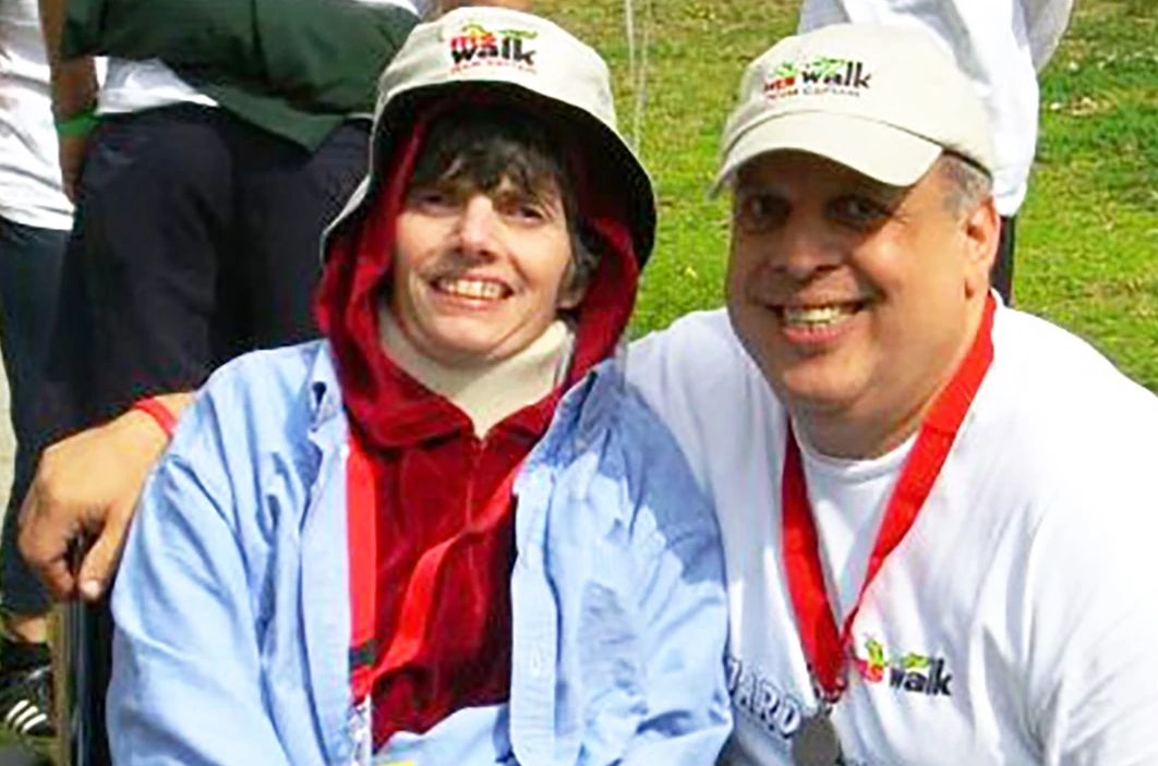 How to Be a Caregiver for Someone with MS two people posing for a picture