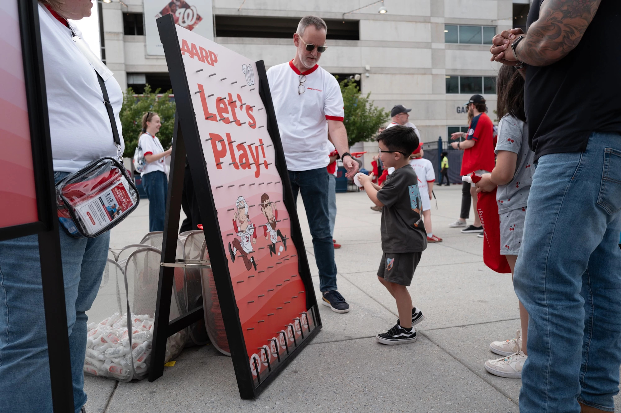 a photo shows a young fan at the AARP Foundation's night at Nationals Park.