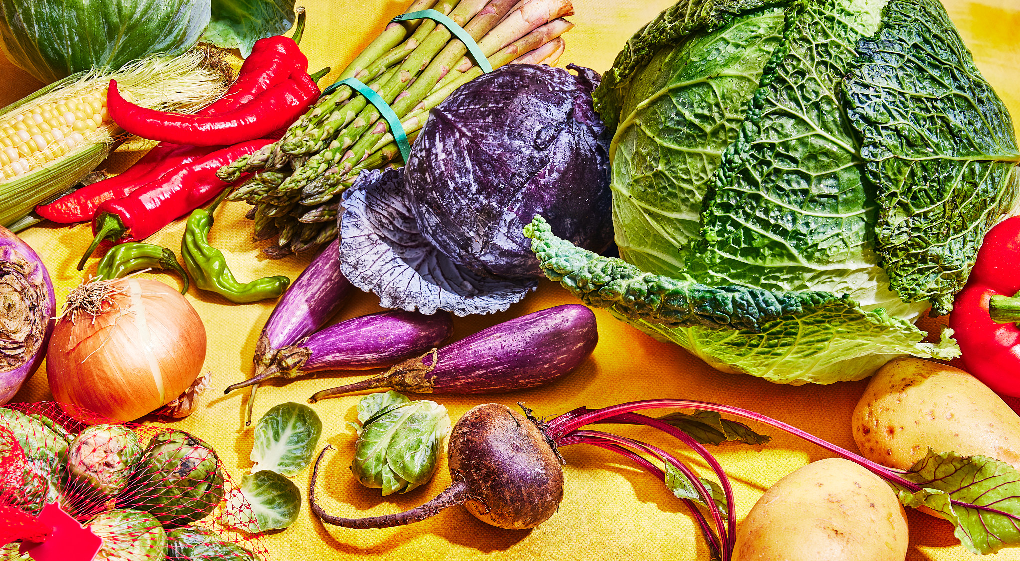 Eat Vegetables First vegetables on a yellow background