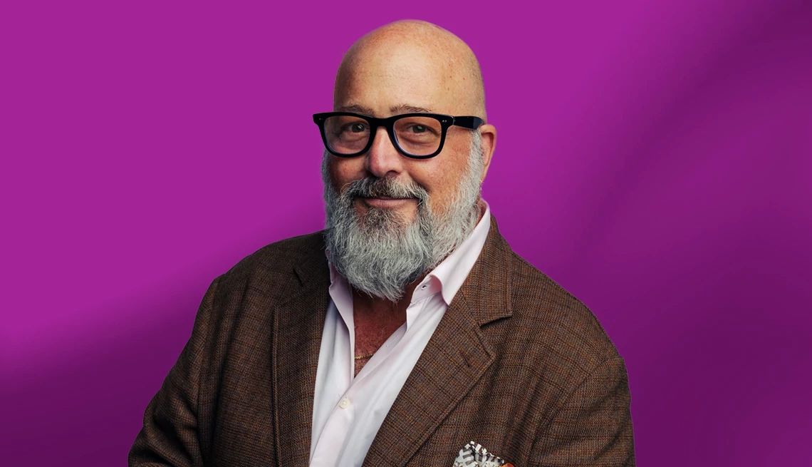 Andrew Zimmern interview Andrew Zimmern against purple ombre background