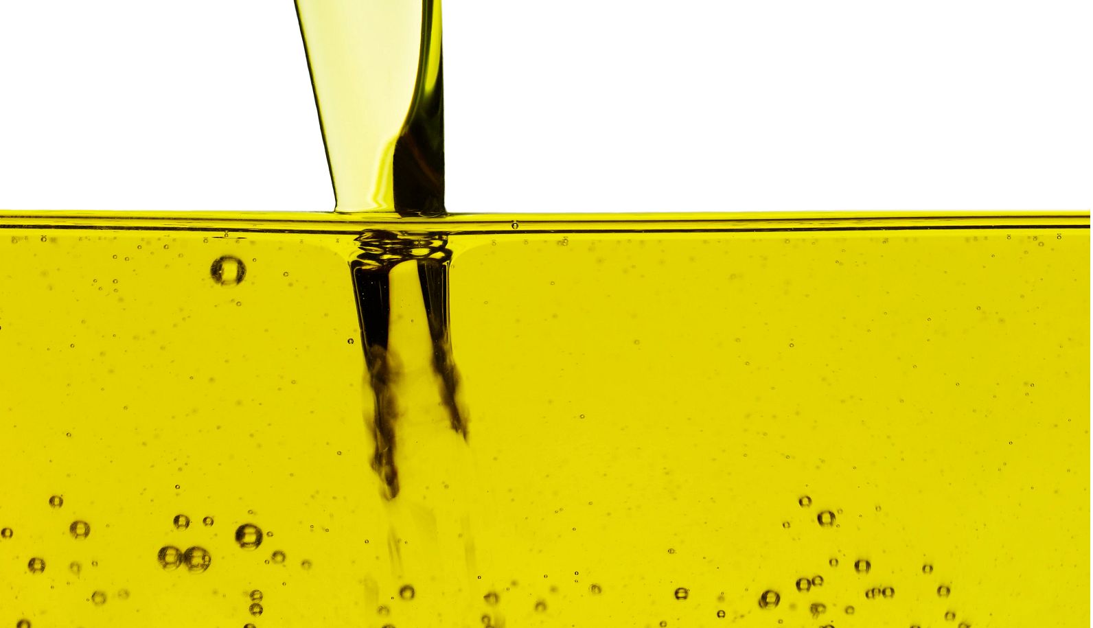Seed Oils oil being poured into glass container