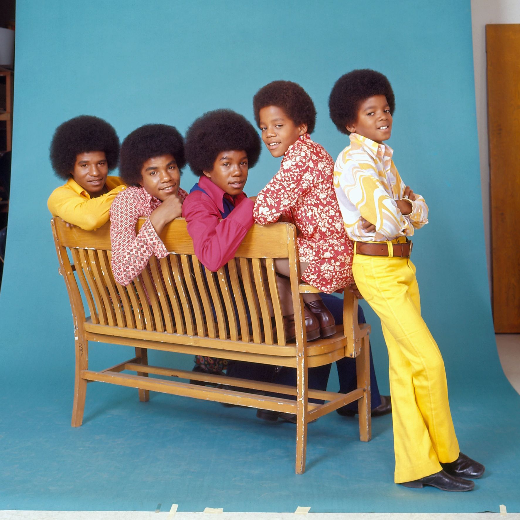 Jackson 5 The Jackson 5 pose for a studio portrait sitting on a bench in 1972 in Los Angeles