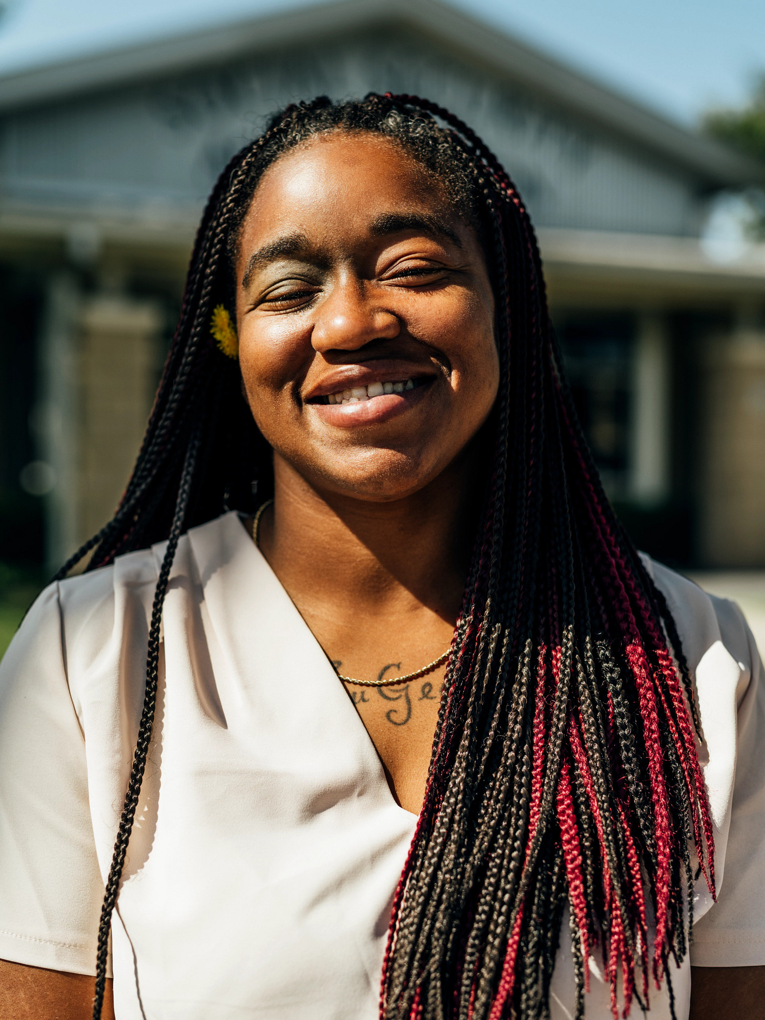 sherelle gibson smiles outside of a social security office