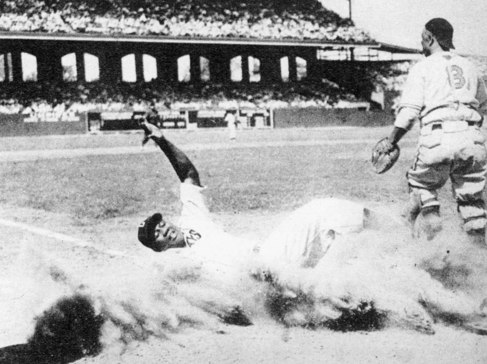 josh gibson slides into home plate in nineteen fourty four.