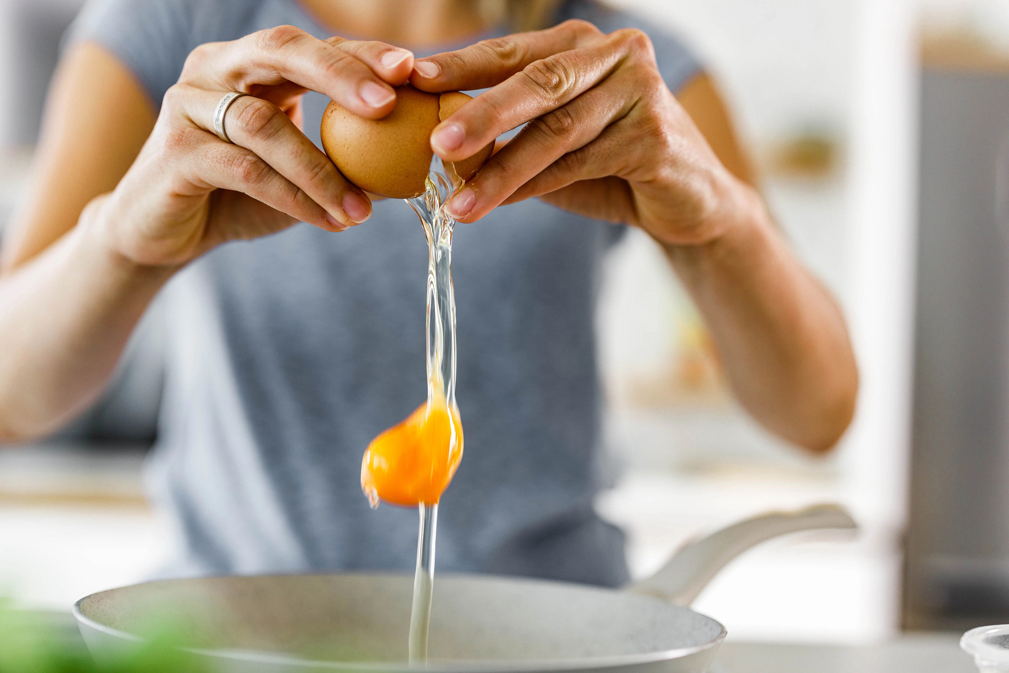 Person making eggs