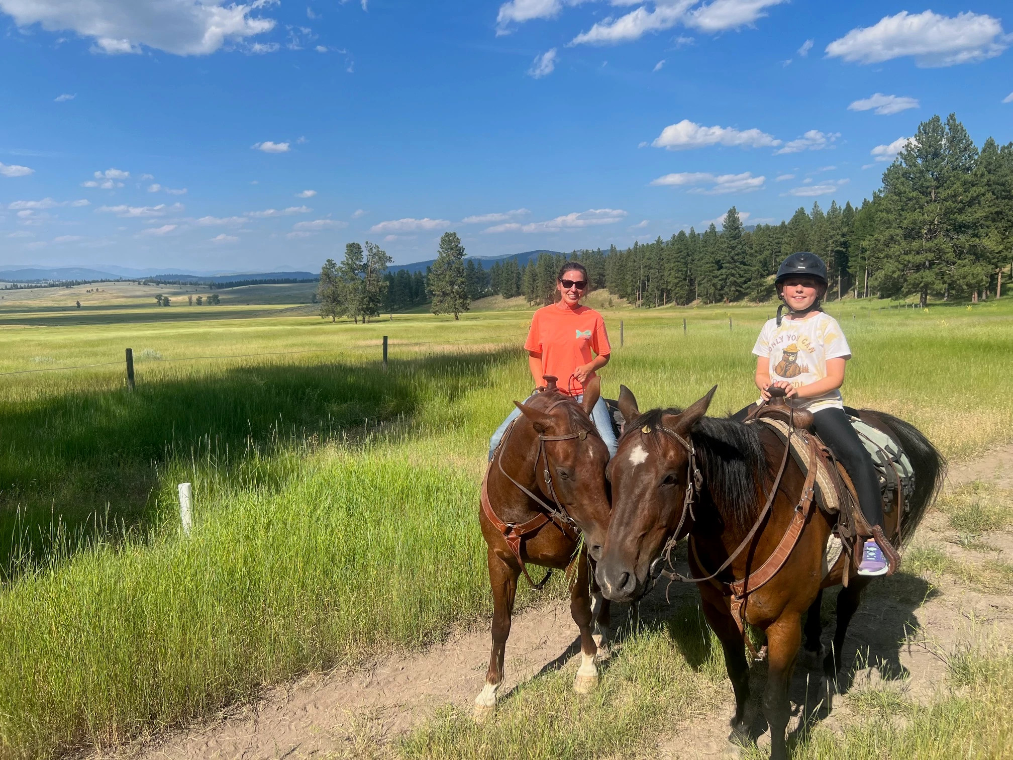 people riding horses
