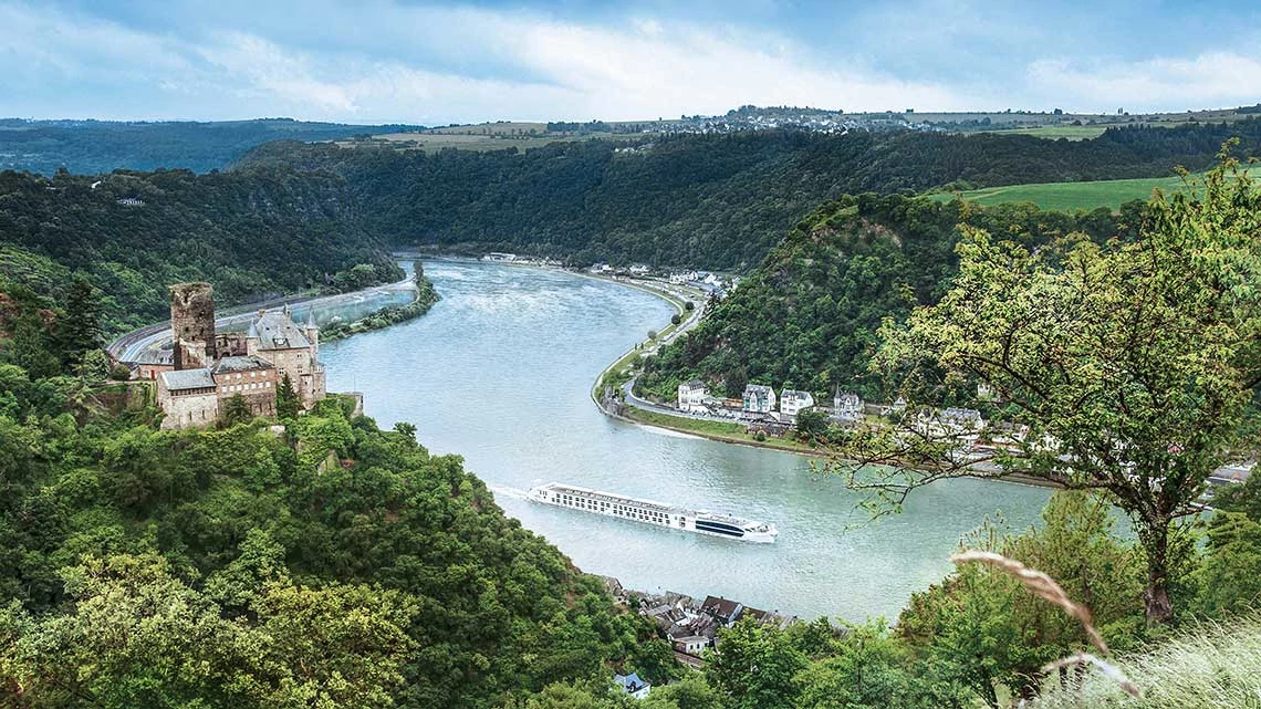 Winding river boat castle forest