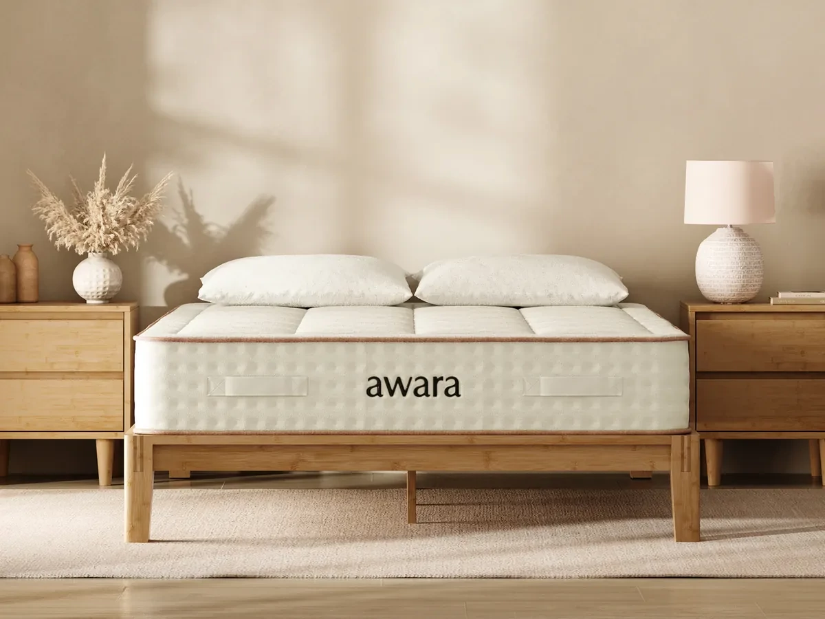 The Awara Essential Hybrid mattress displayed on a bedframe