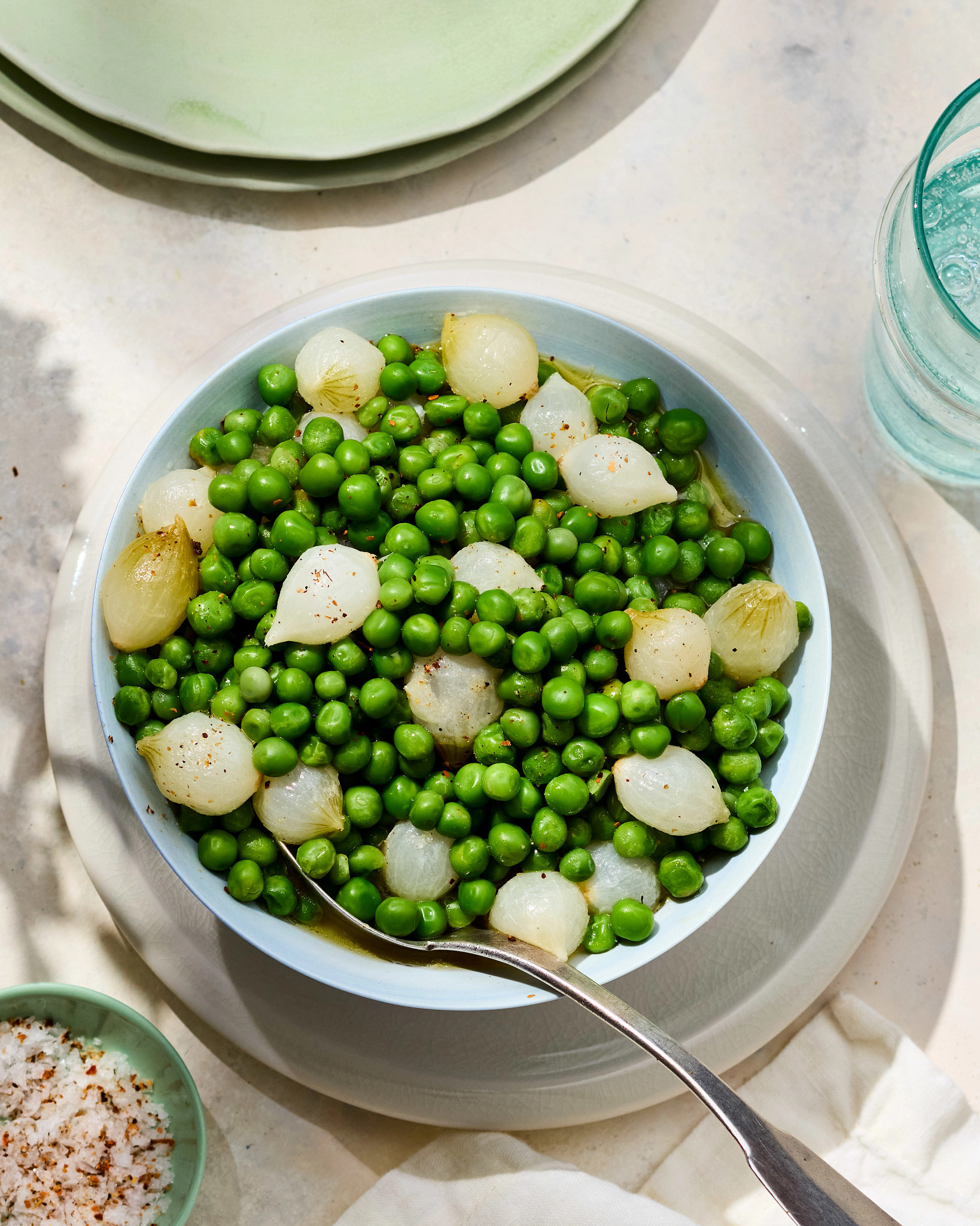 a photo shows Seasoned Peas and Onions