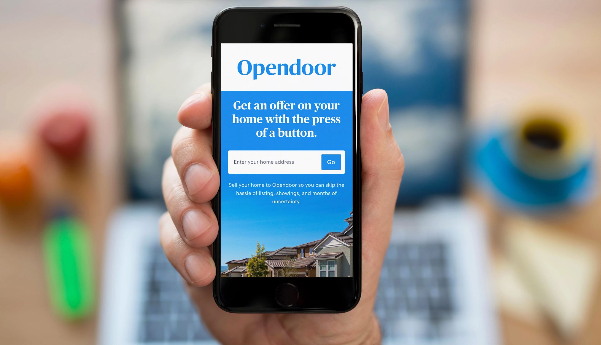 Opendoor ordered to pay home sellers a smartphone displaying Opendoor