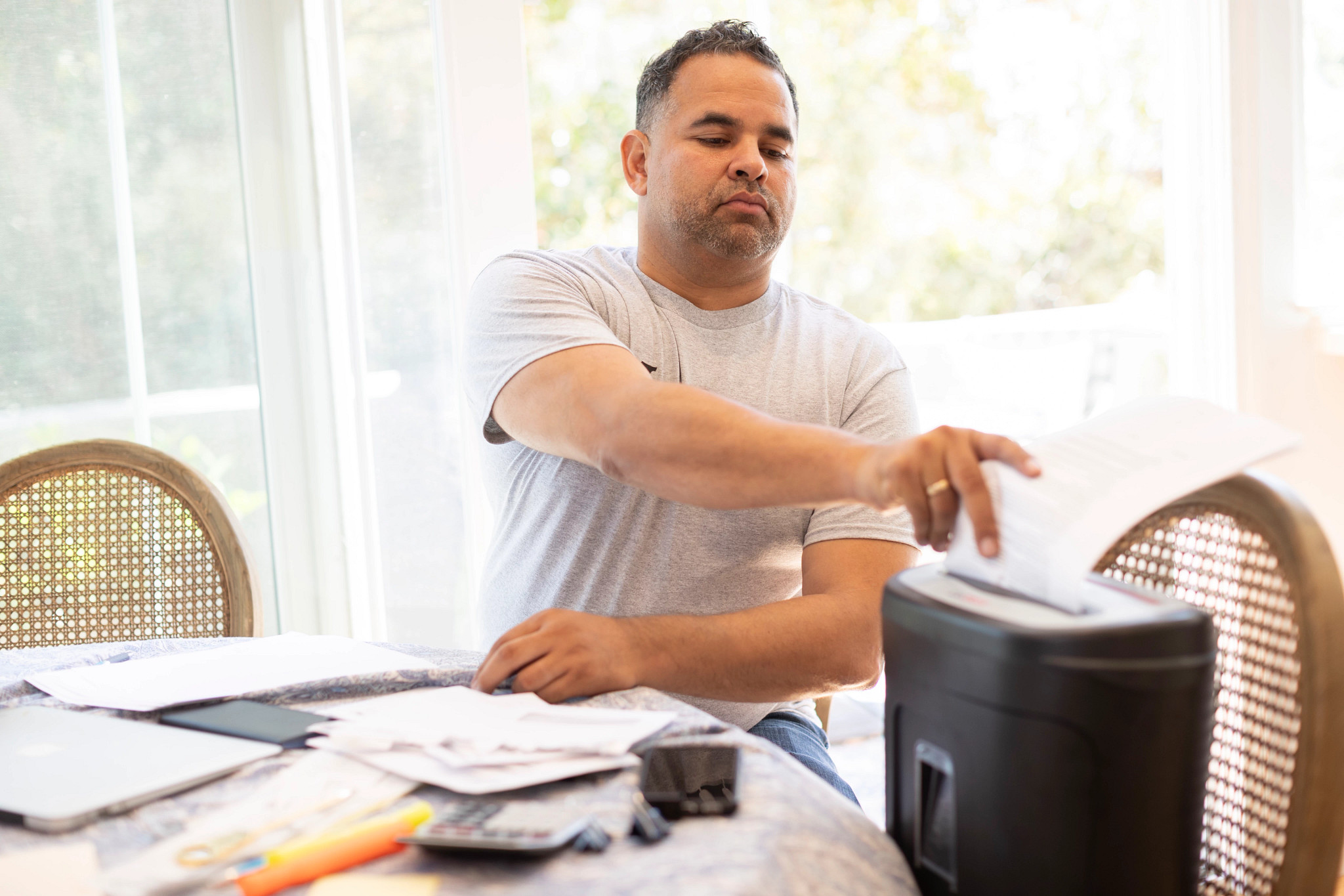 a person shredding documents