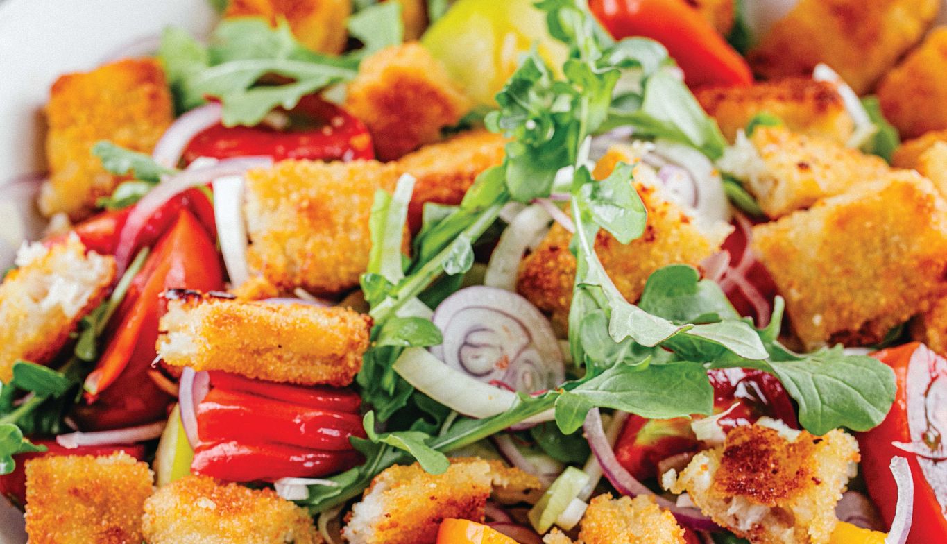 Andrew Zimmern’s Fish Sticks andrew zimmern’s fish sticks and panzanella are shown in a photo