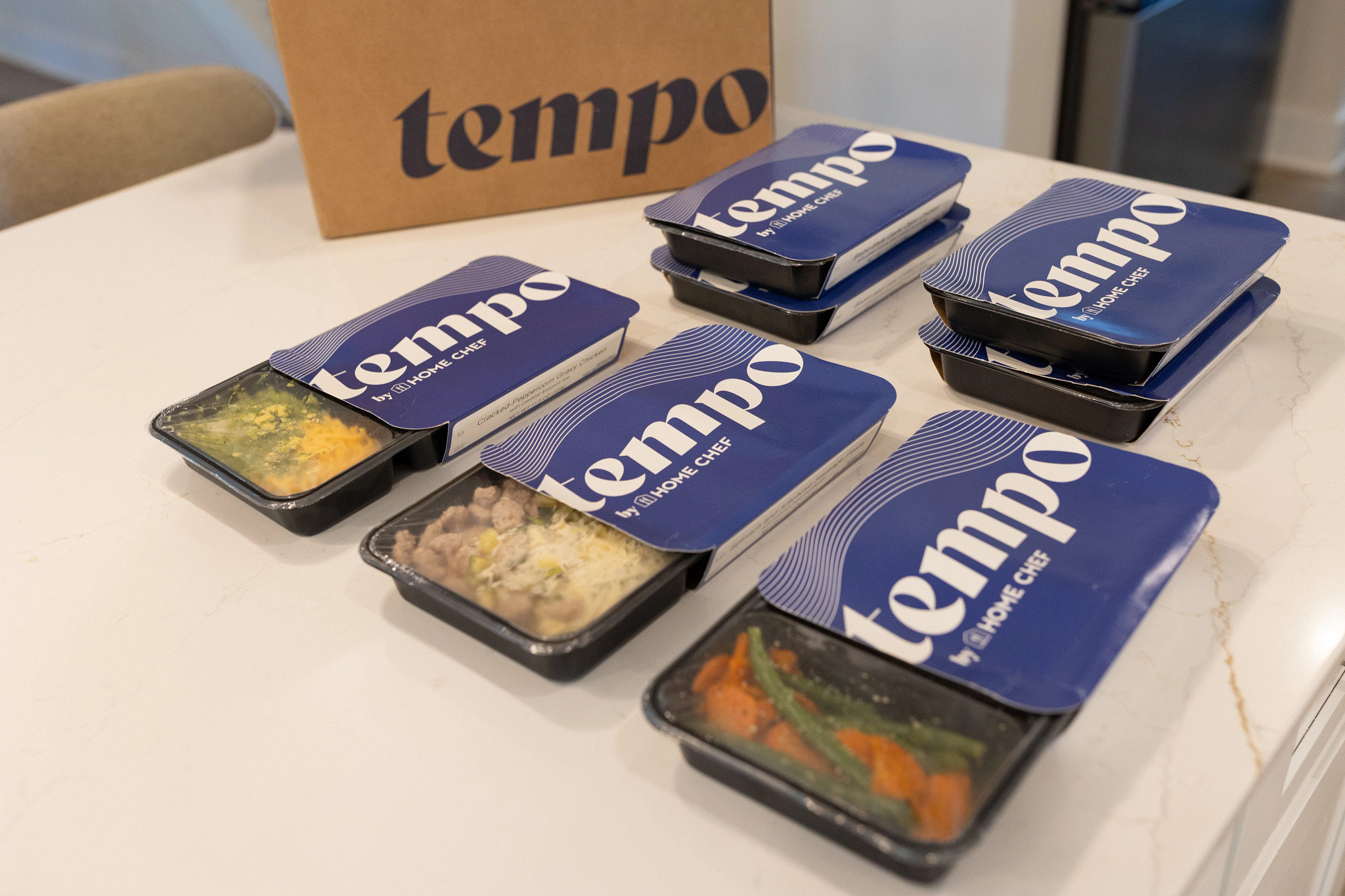 Unpacked Tempo prepared meals on a counter.