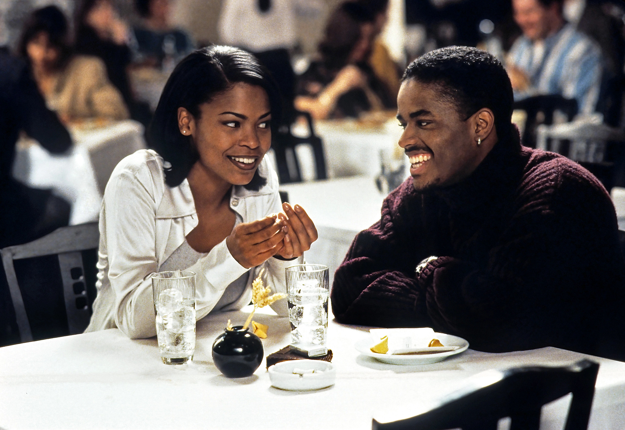 Nia Long and Larenz Tate in a scene from Love Jones