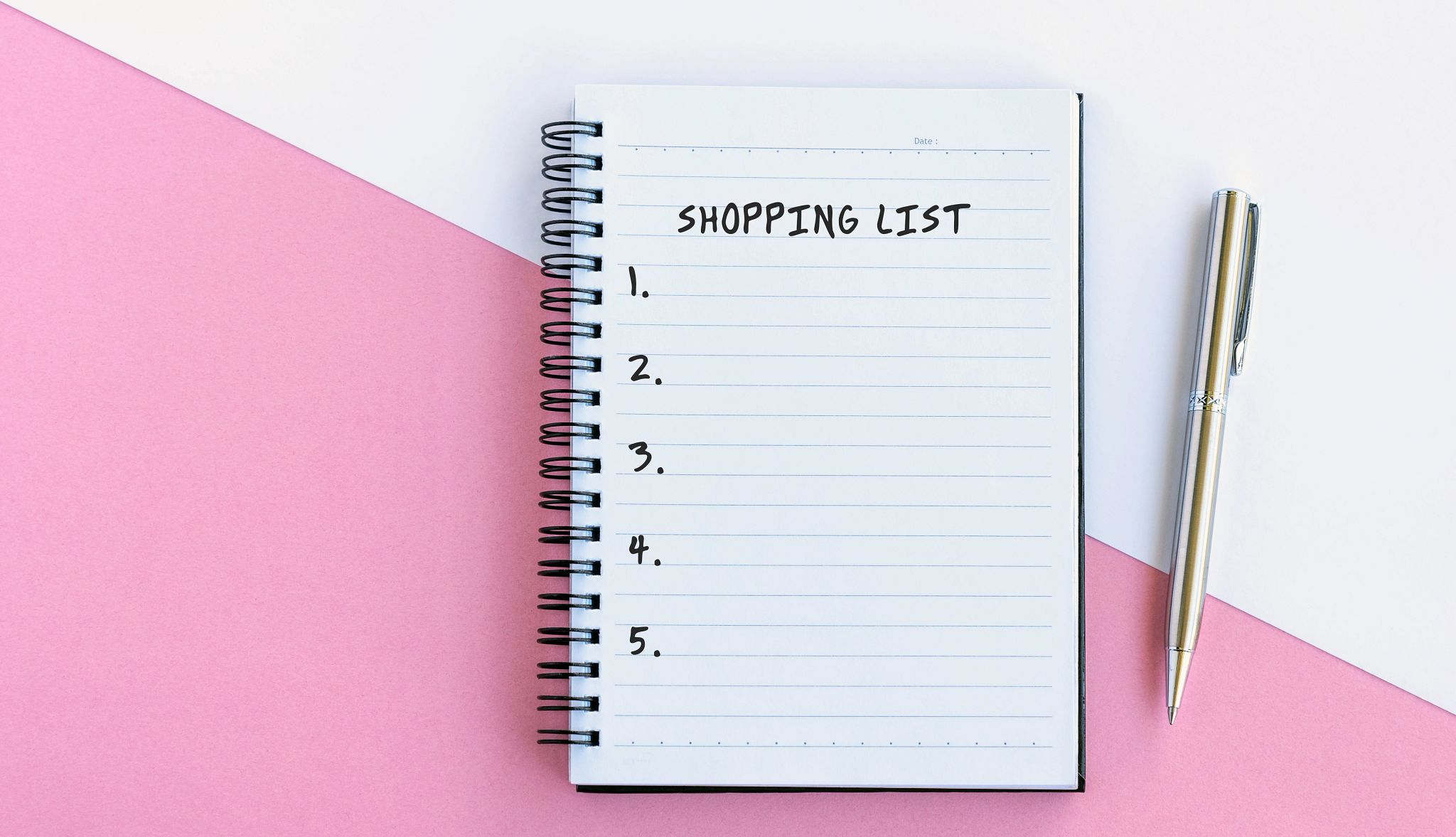 Grocery List An illustration of a spiral notebook open to a page titled shopping list with five numbered choices waiting to be filled in. A pen is next to the notebook.