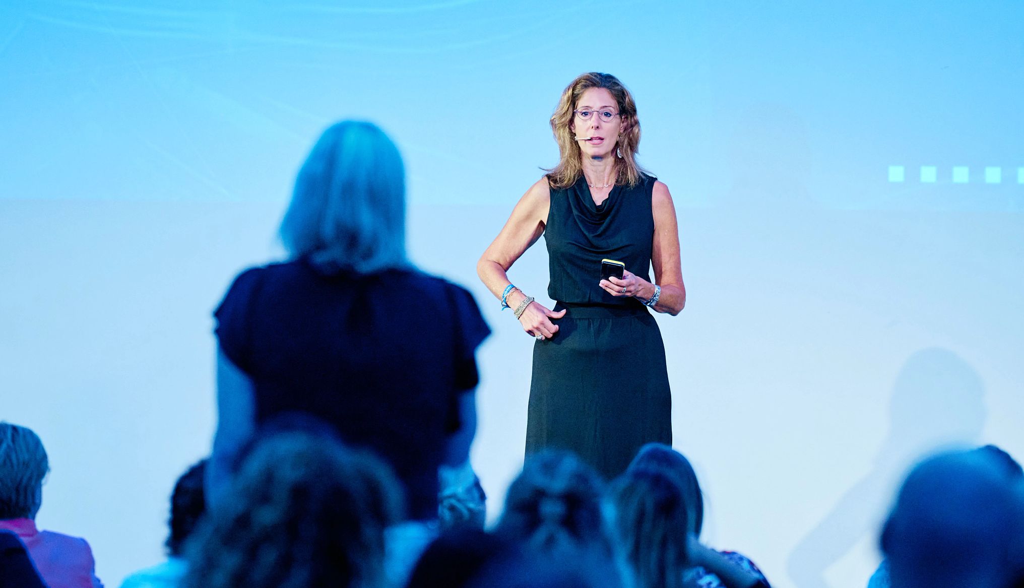 Can She Pass Her First Manifestation Challenge? Melina Bellows during her presentation