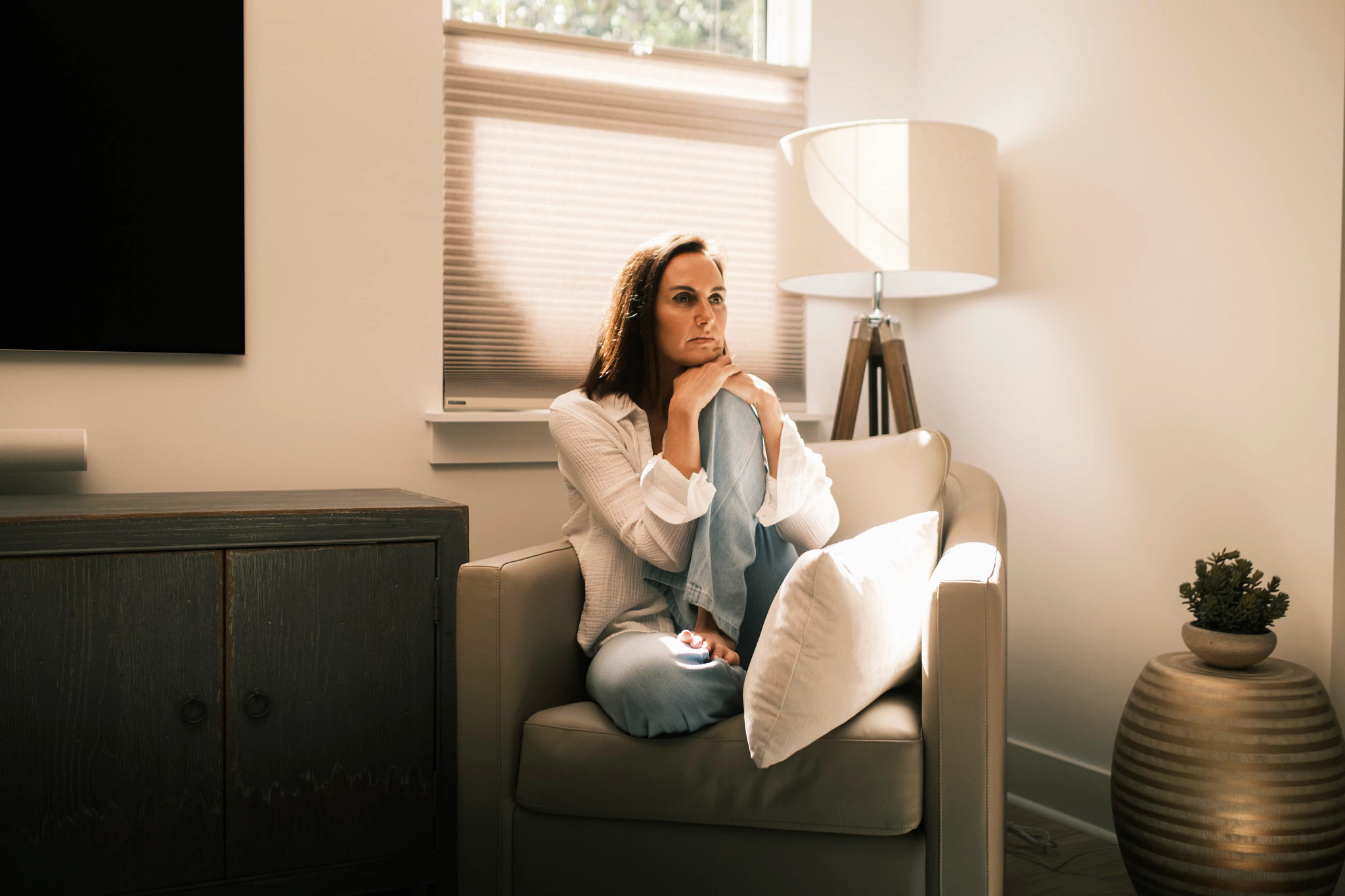 a woman sitting in a chair