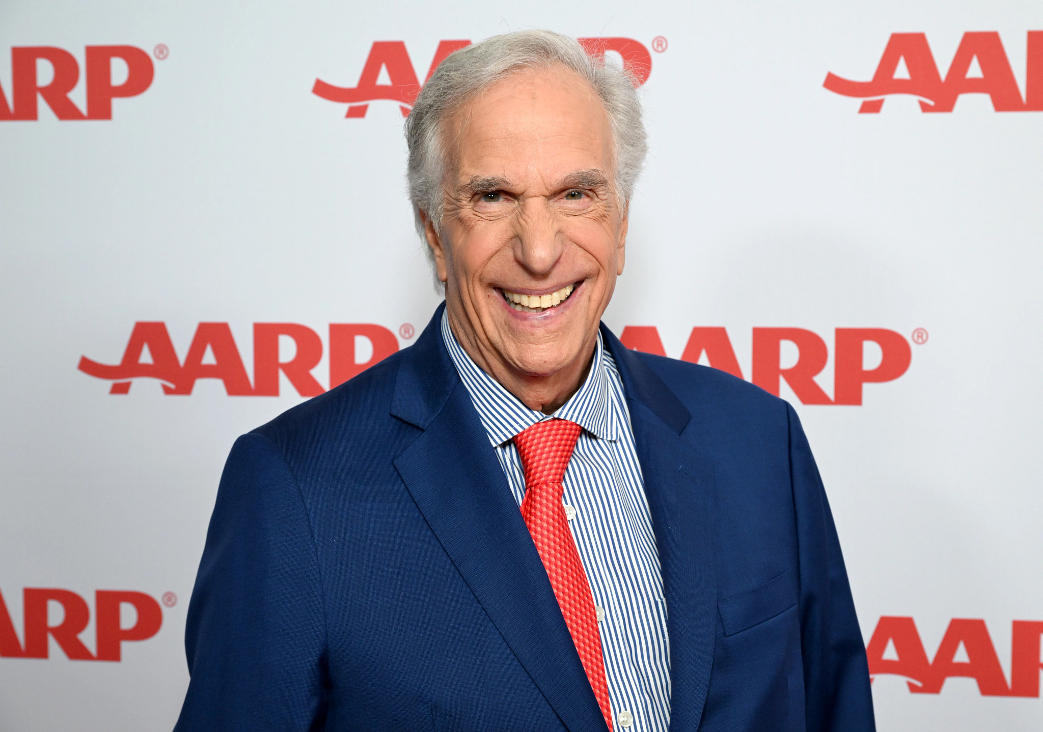 Henry Winkler smiling at an A A R P event