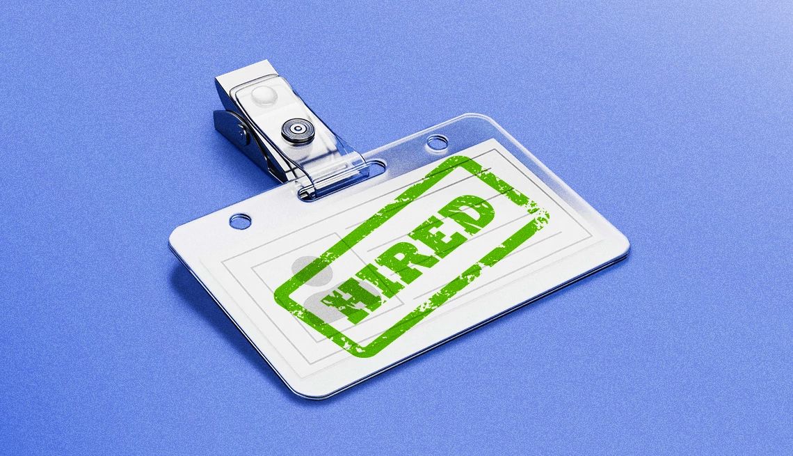 Smart Guide to Getting Hired a badge with the word hired stamped on it in green