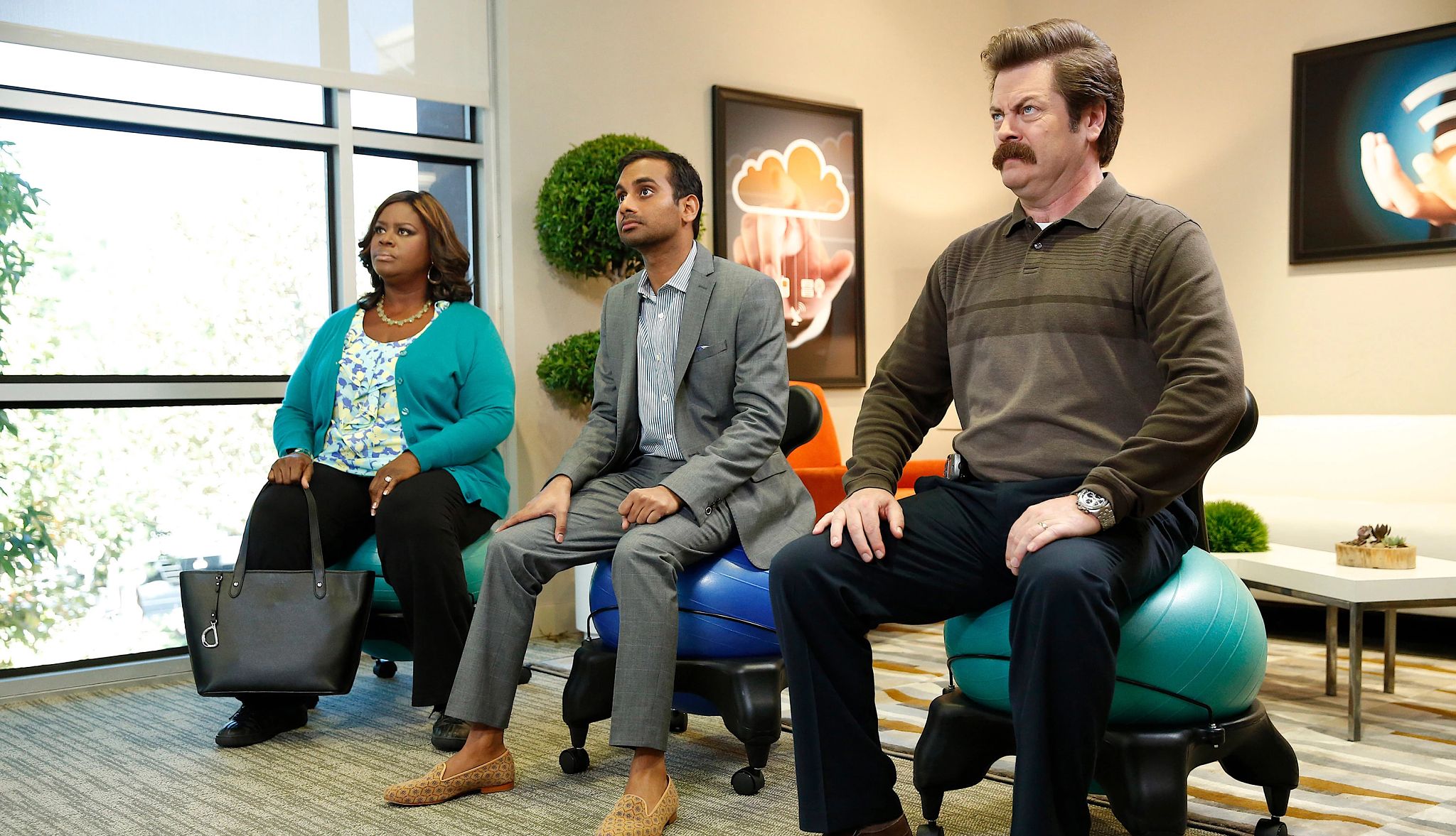Retta starred in 'Parks and Recreation' Retta, Aziz Ansari and Nick Offerman sitting on exercise balls in a still from Parks and Recreation