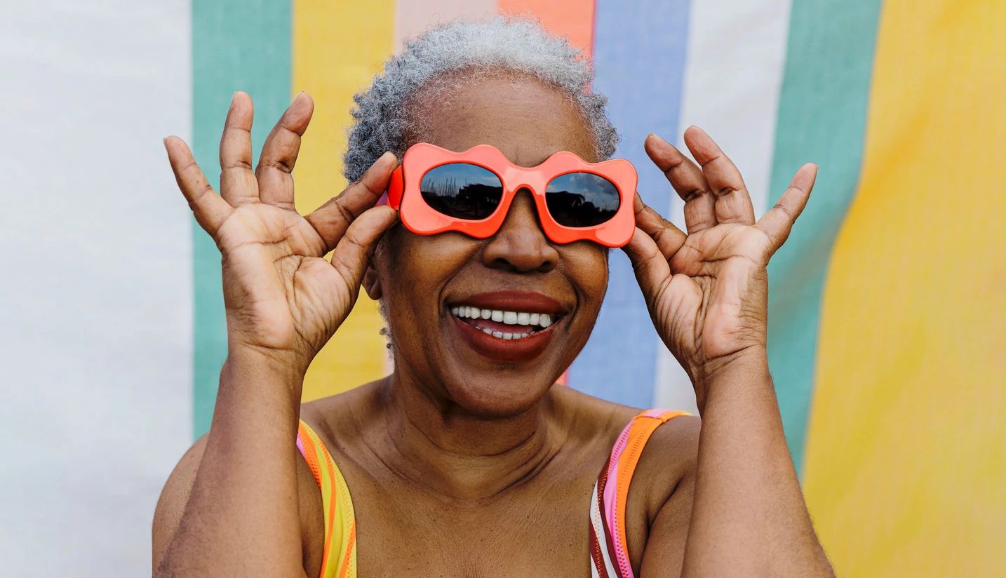 Why to Wear Sunglasses woman wearing sunglasses