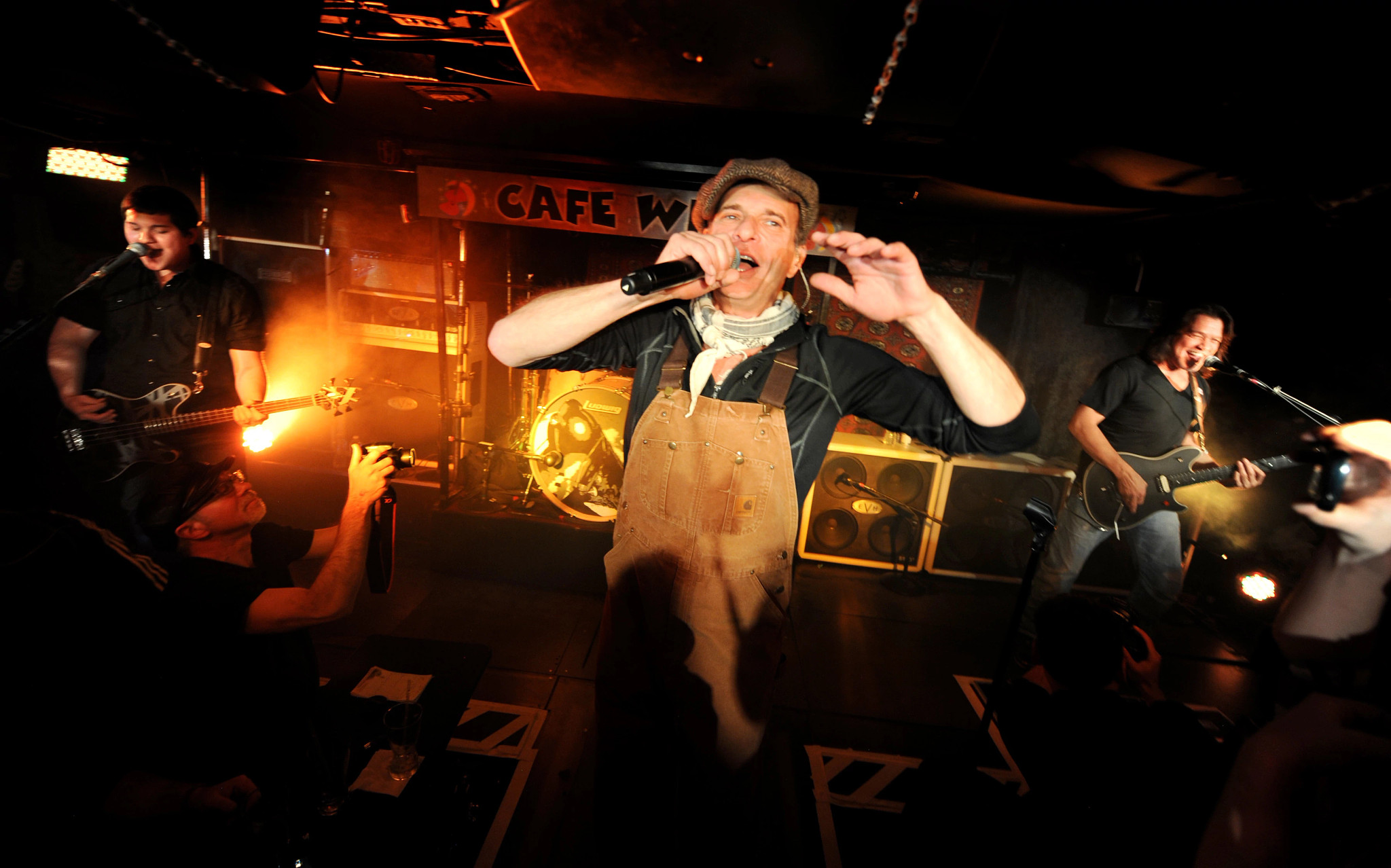 Wolfgang Van Halen, David Lee Roth and Eddie Van Halen performing on stage
