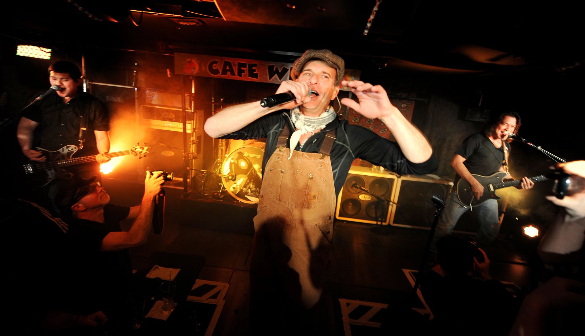 Van Halen performing Wolfgang Van Halen, David Lee Roth and Eddie Van Halen performing on stage