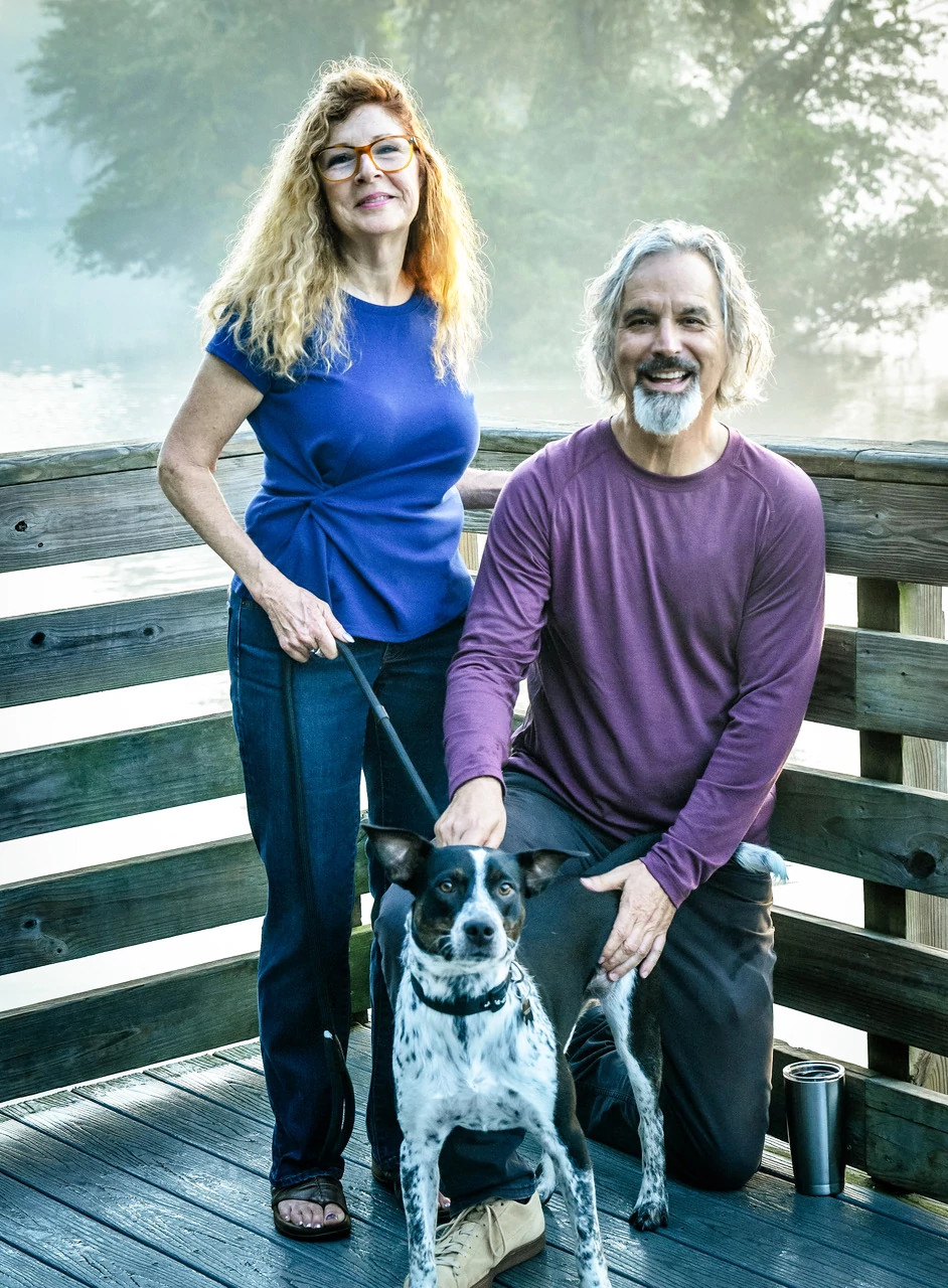A photo shows Echo and Kevin Garrett with their dog Scout