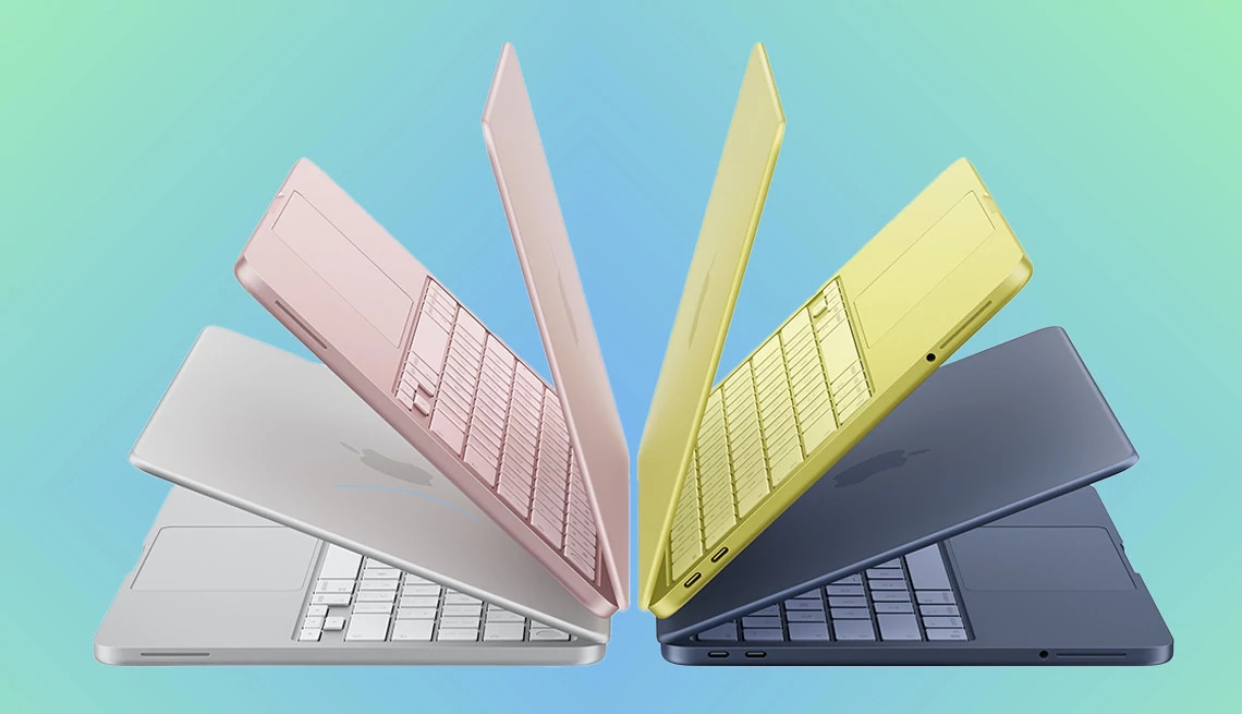 a graphic illustration shows four apple laptops opening up in a fan-like formation