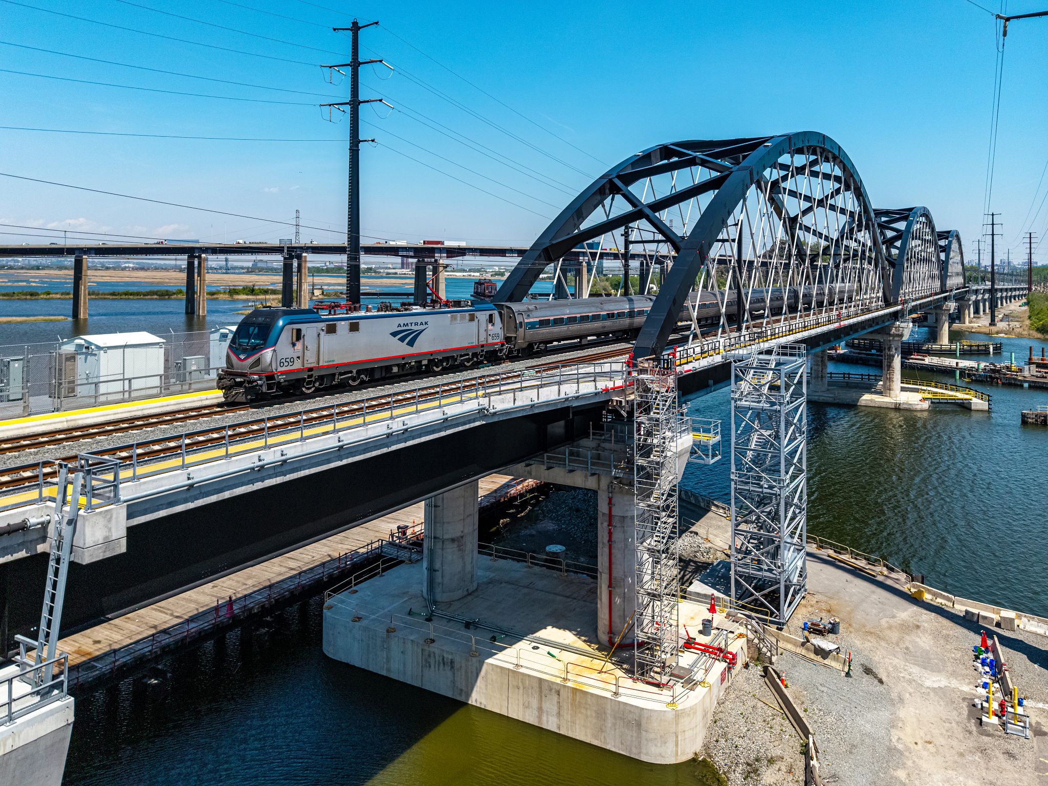 Scenic Coastal Train Routes an amtrak train traveling on a bridge