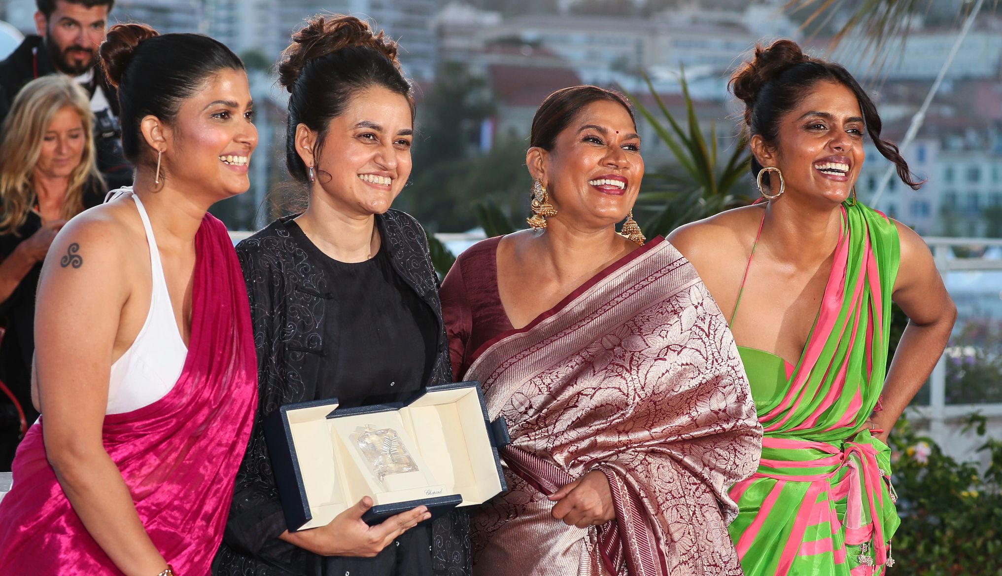 Divya Prabha, Payal Kapadia, Chhaya Kadam and Kani Kusruti Divya Prabha, Payal Kapadia, Chhaya Kadam and Kani Kusruti pose together with the Grand Prix Award at the 77th Cannes Film Festival