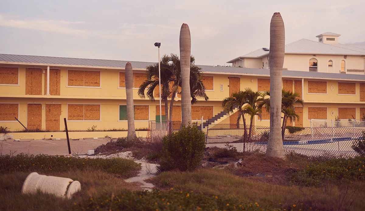 A boarded up hotel