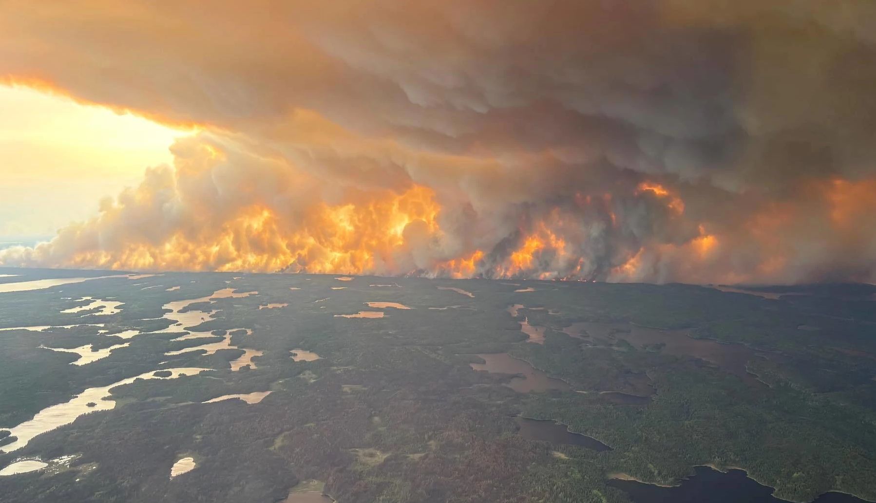 Wildfires and Indoor Air Quality a wildfire over a city