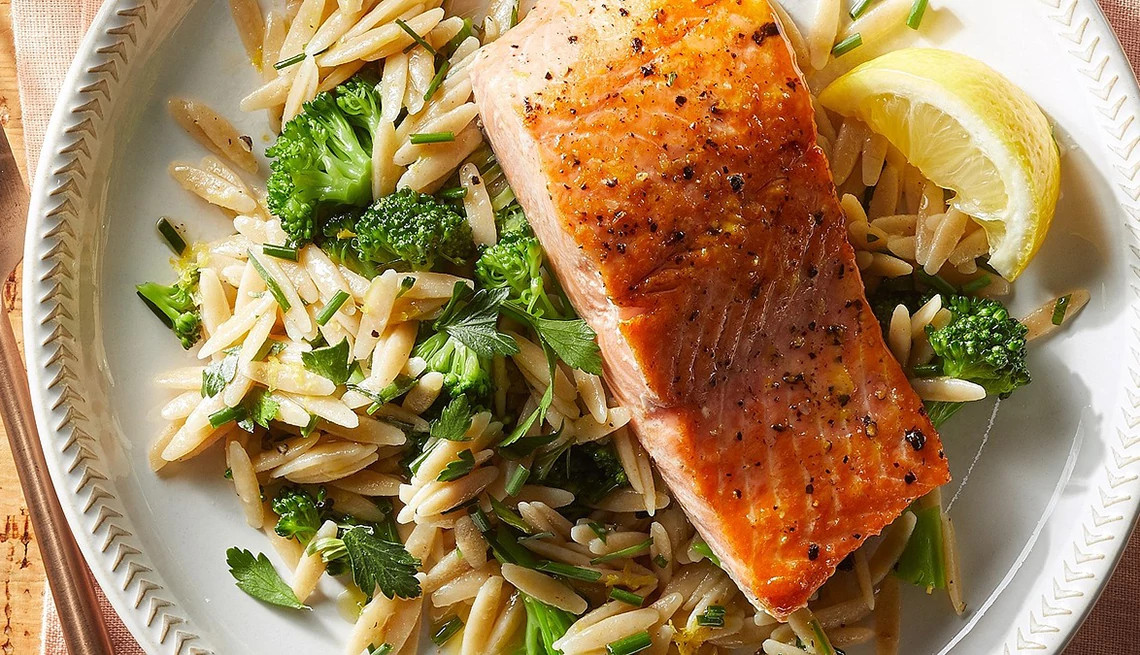 https://aarp.widen.net/content/52p7jdppnb/jpeg/1140-salmon-lemon-herb-orzo-broccoli.jpg?crop=true&anchor=0,0&q=80&color=ffffffff&u=xp0vsk&w=1140&h=655