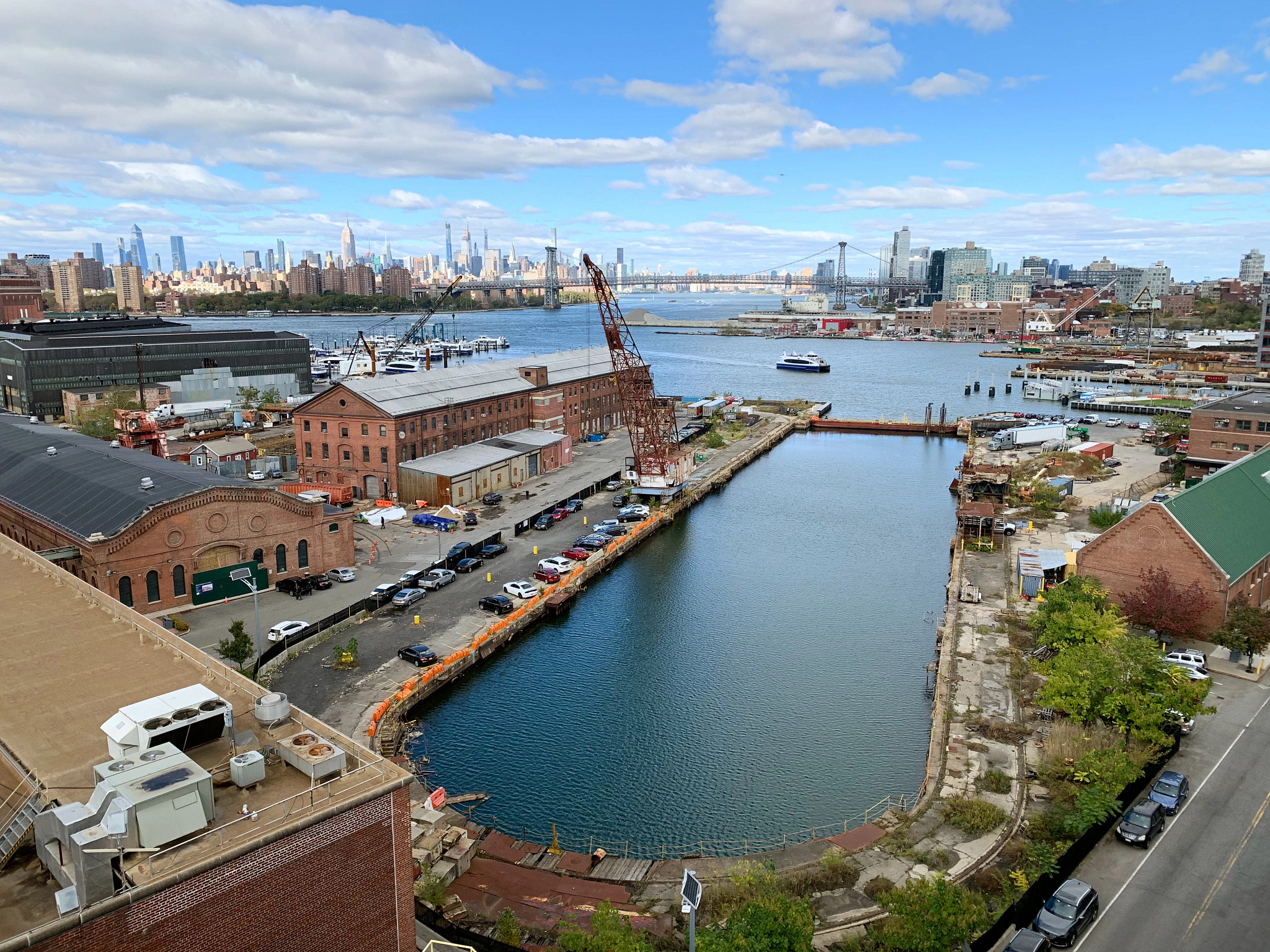 the Brooklyn Navy Yard with the New York City skyline in the background
